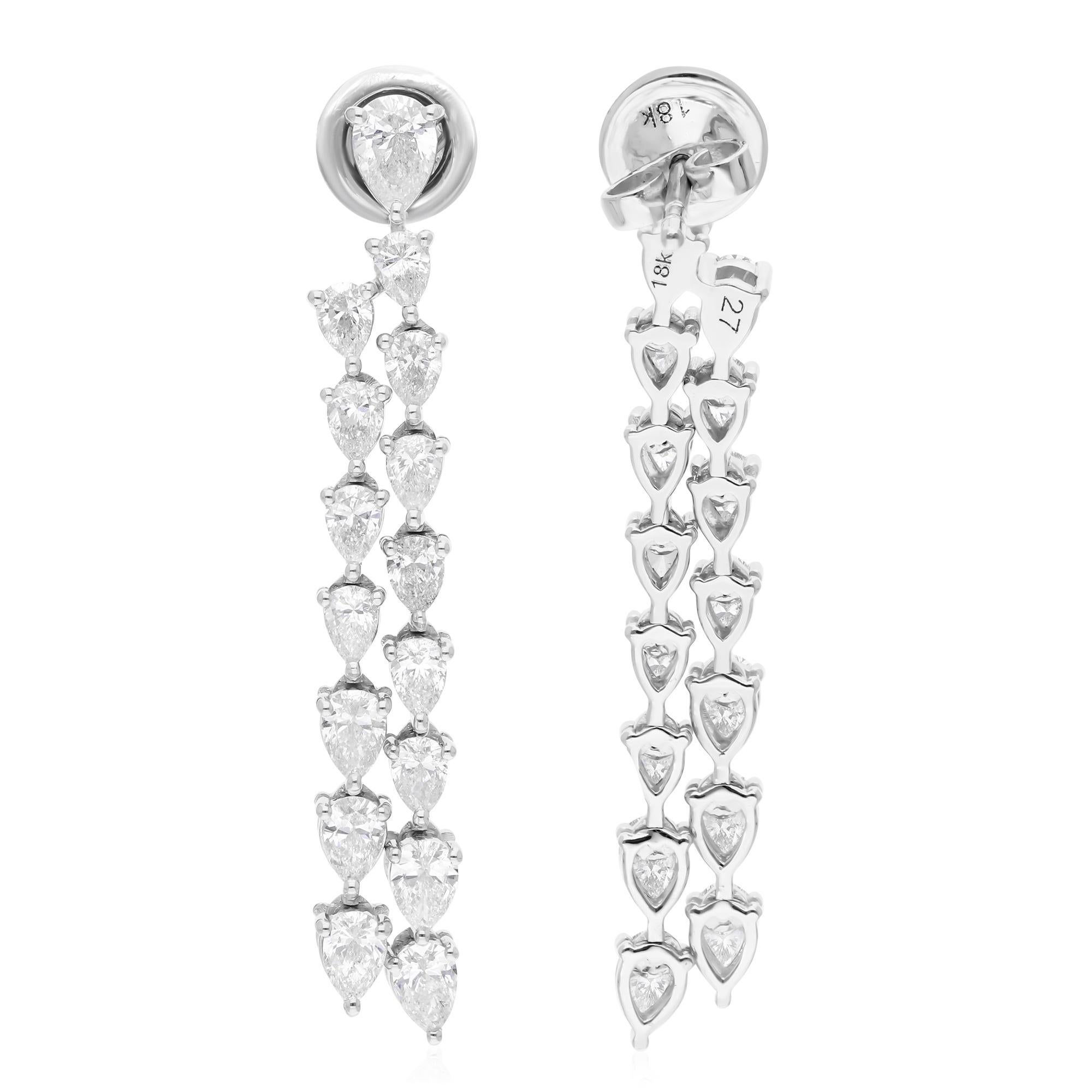 Experience the epitome of elegance with these exquisite 3.61 Carat Pear Shape Diamond Earrings, a stunning addition to any jewelry collection. Crafted in radiant 18 Karat White Gold, these earrings offer a classic yet contemporary design that