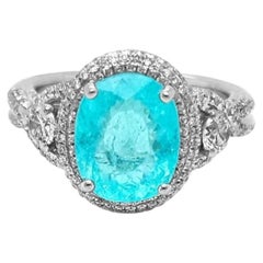 Anillo con turmalina Paraíba de 3,61 ct, de color azul-verde neón intenso y con trazas de cobre, en oro blanco de 18 quilates