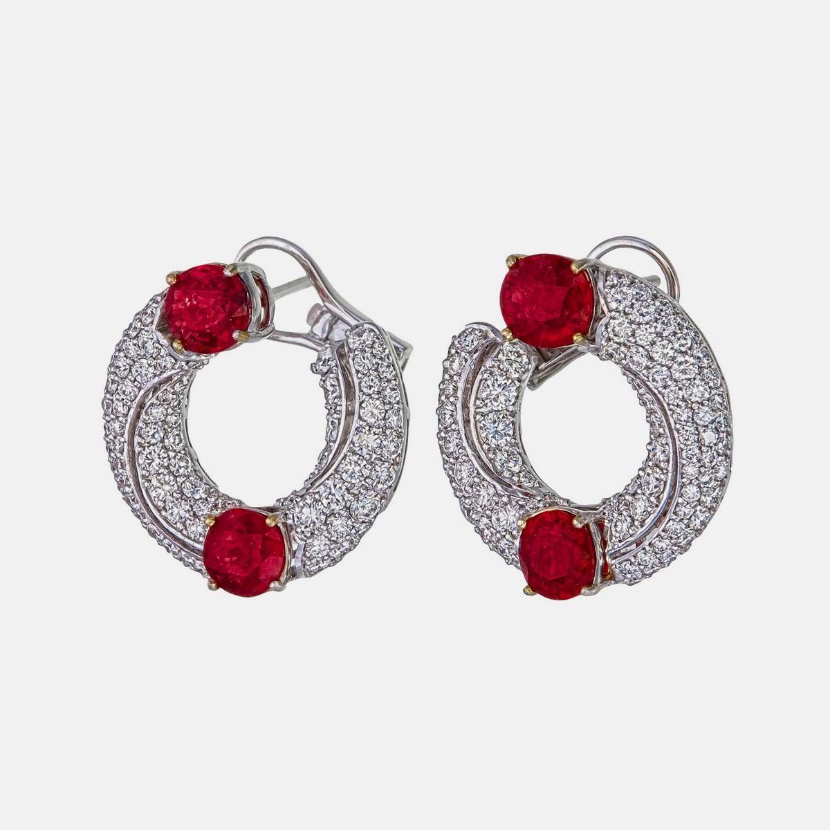 A classic elegance for your jewels collection with these stunning ruby and diamond earrings made by Rewa jewels crafted in 18 karat white gold.

There are 4 pieces of Burmese rubies without any heat treatment, weighing approximately 3.62 carat