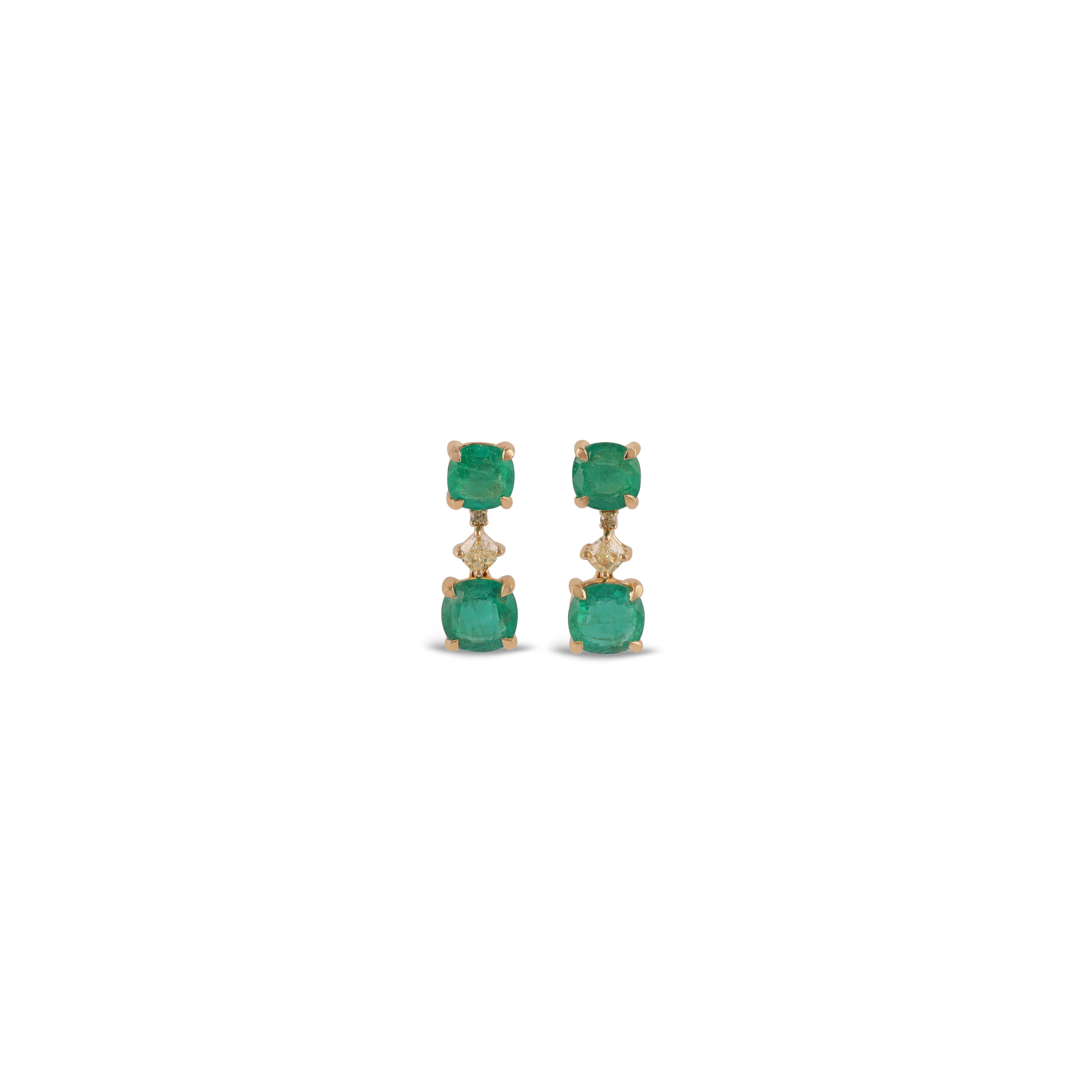 This is an elegant emerald & diamond Earring studded in 18k Yellow gold with 4 piece of  Zambian emerald weight 3.62 carat With 4 pieces of  fancy Color diamonds weight 0.41 carat, this entire Earring studded in 18k Yellow gold


 its a classic