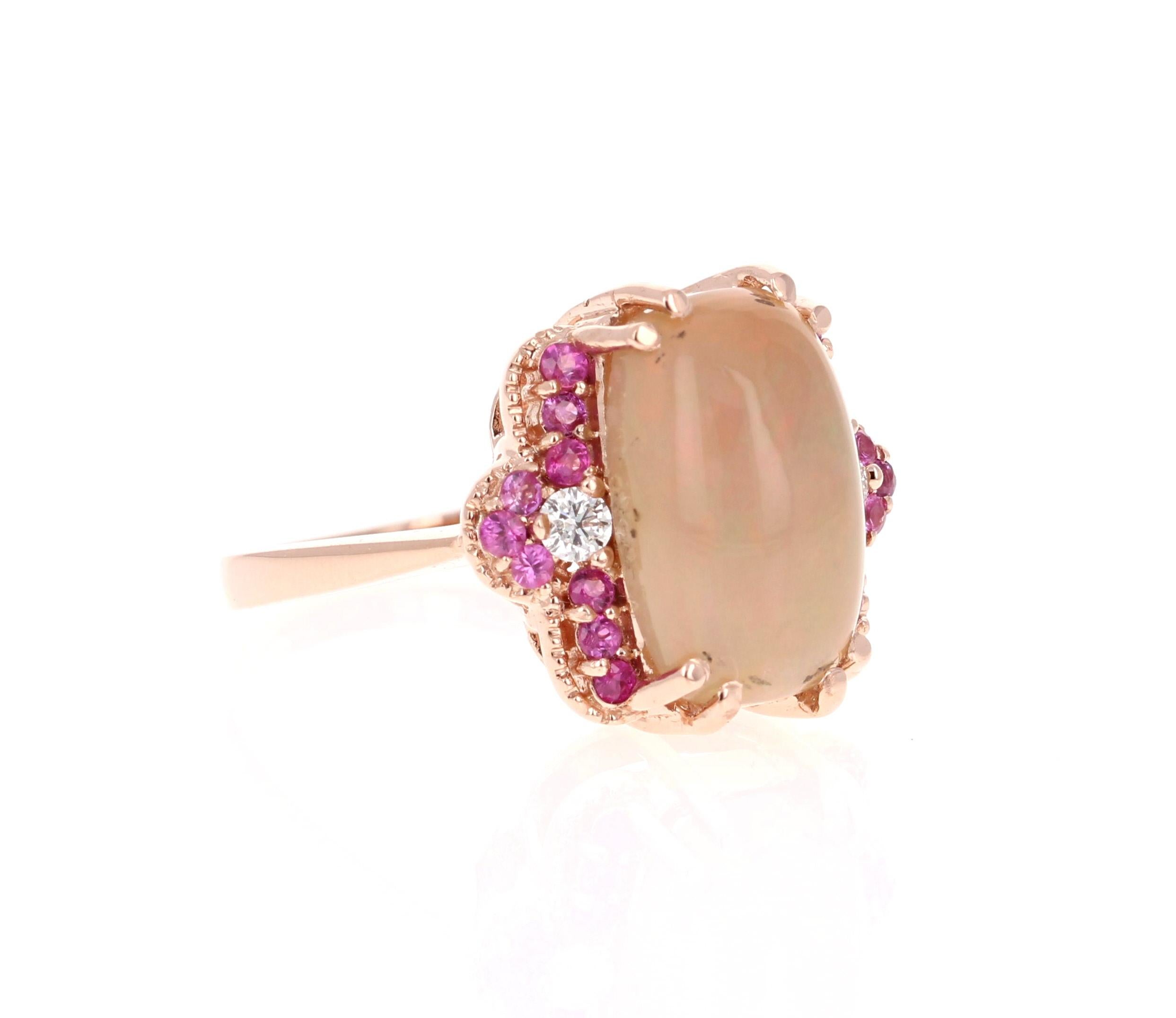 3.62 Carat Oval Cut Opal Diamond Rose Gold Ring

The Oval Cut Opal in this ring weighs 3.19 carats and the measurements of the Opal are 9 mm x 14 mm. The Opal is surrounded by 2 Round Cut Diamonds that weigh 0.12 carats and also 18 Pink Sapphires