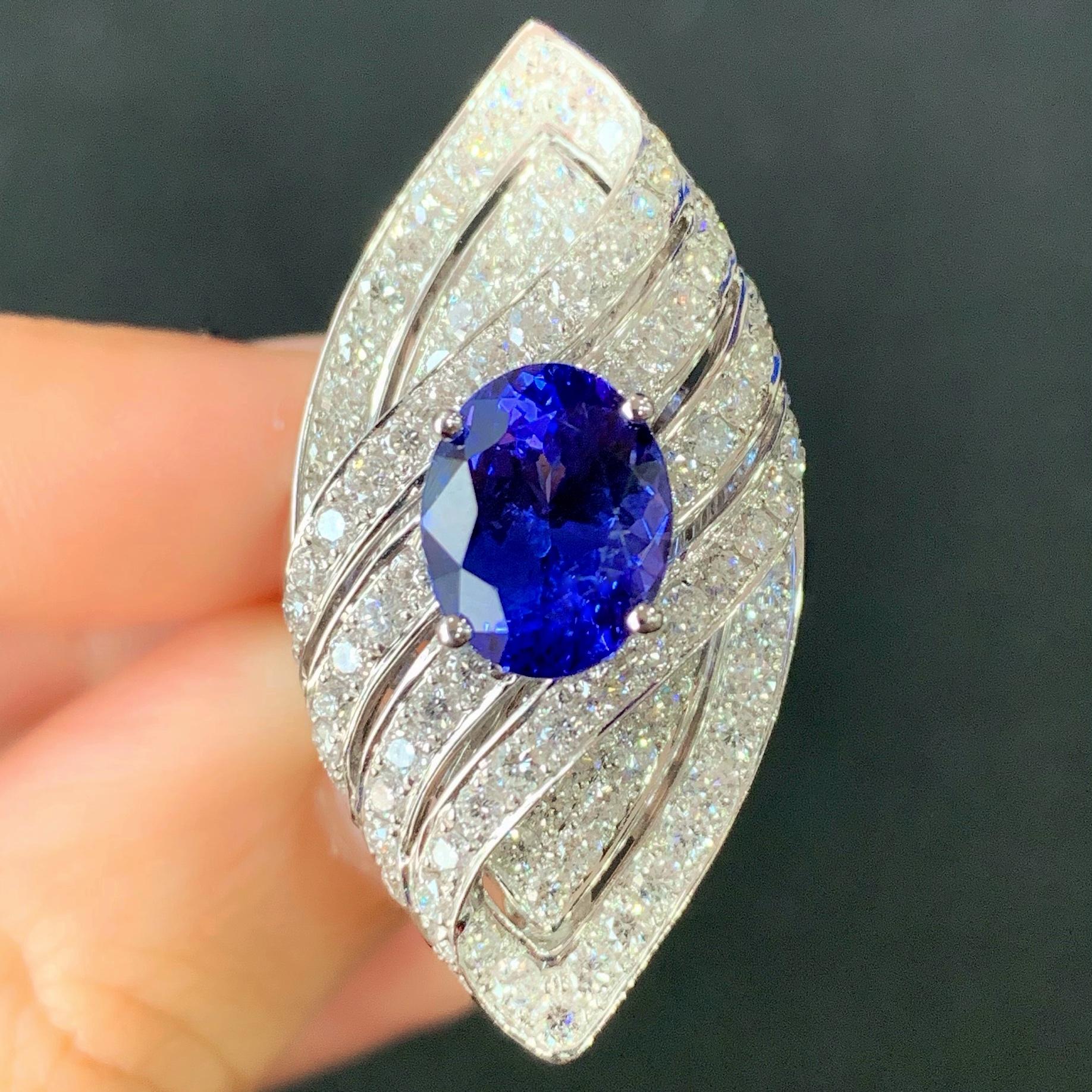 Oval Cut 3.62 Carat Oval Blue Tanzanite 18 Karat White Gold Diamond Cocktail Ring For Sale