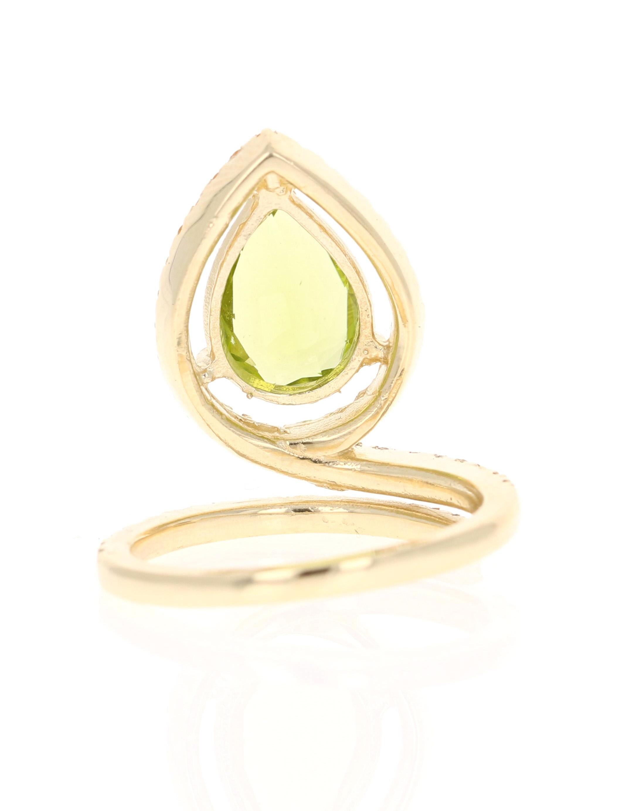 Pear Cut 3.62 Carat Natural Peridot Diamond Sapphire Yellow Gold Ring