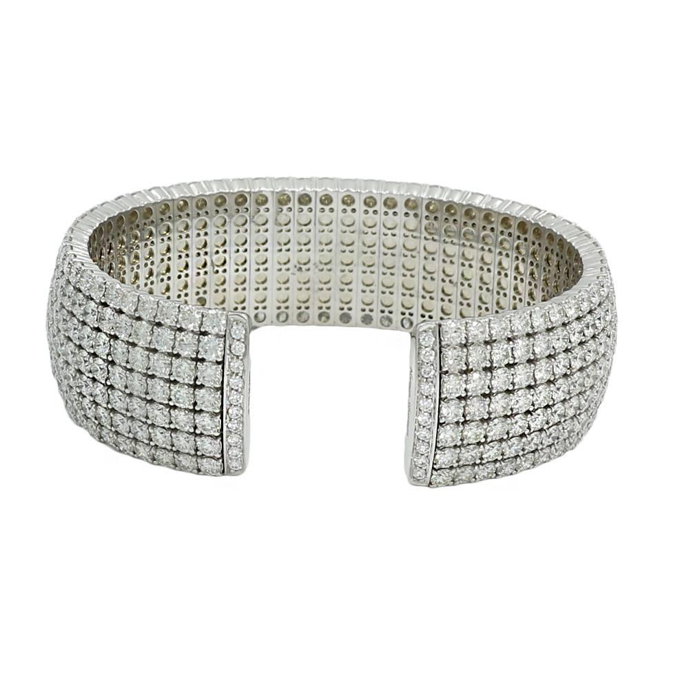 18K White Gold Cuff With 7 Rows Of Pave Diamonds. It Has 412 Round Brilliant Cut Diamonds That Weigh 36.24 Carats Total Weight. It Measures 0.875 Inches In Width and Weighs A Total Of 102.3 Grams. 