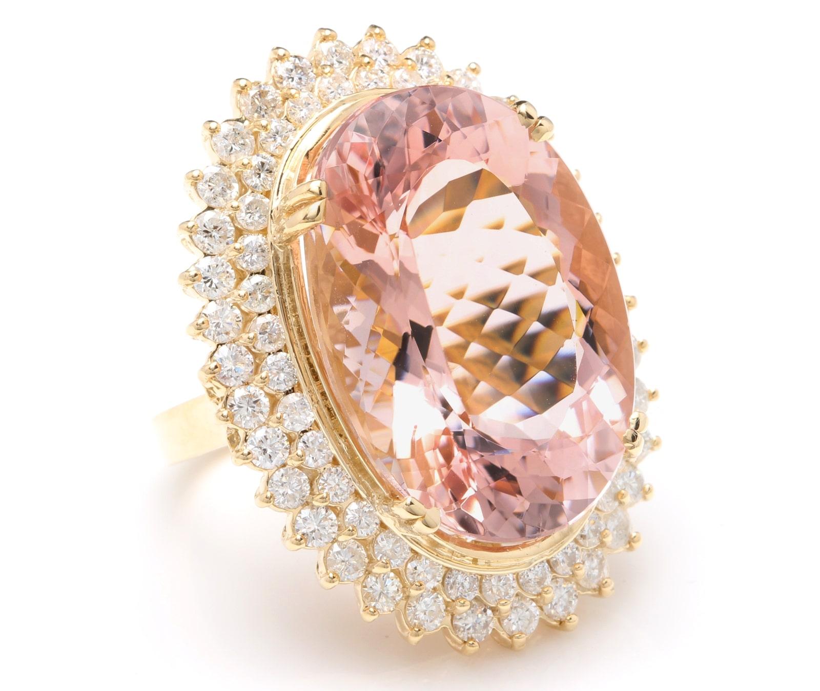 36.25 Carats Exquisite Natural Morganite and Diamond 14K Solid Yellow Gold Ring

Suggested Replacement Value: 15,000.00

Total Natural Oval Morganite Weight is: Approx. 33.00 Carats 

Morganite Measures: 26.00 x 18.00mm

Natural Round Diamonds