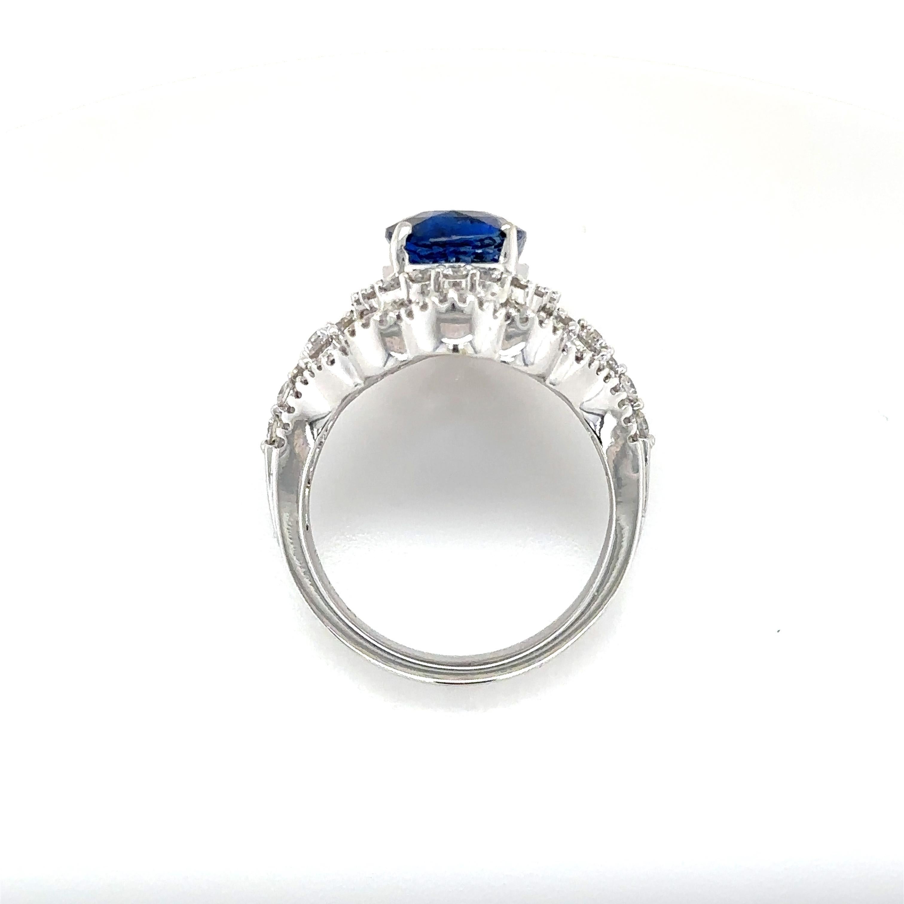 This bespoke ring is a true work of art, crafted from the finest workmanship to create a breathtakingly beautiful piece of jewelry that is both unique and elegant. Made from 18k white gold, this ring features a rare and exquisite 3.62ct. oval-cut