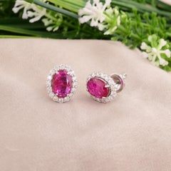 3.63 Carat Oval Ruby 0.85 Carat SI/H Diamond Earrings 14 Karat White Gold