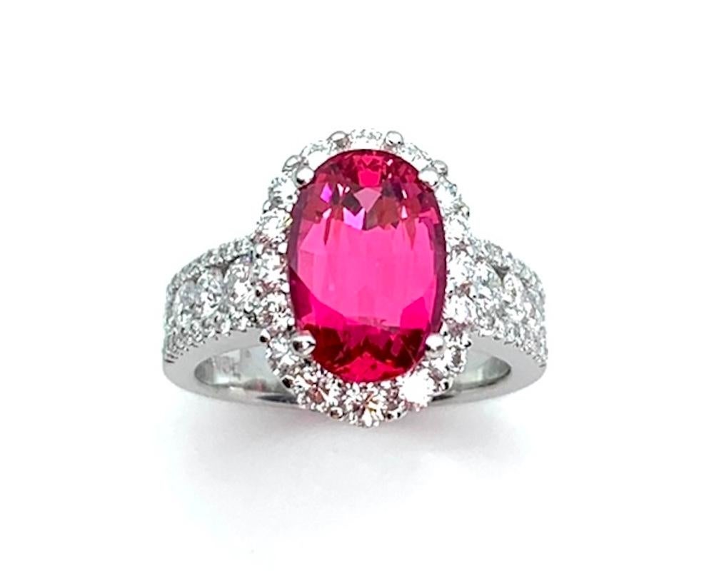 The color of this absolutely spectacular, fuchsia-red spinel is so vibrant, it has an almost neon quality! Spinels with such vivid pure color and fine crystalline quality are extremely rare, especially in this size. In addition to superior color and