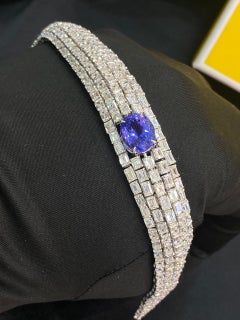 Bracelet tennis en or 18 carats, diamants taille émeraude F/VS1 IGI 36,30 carats