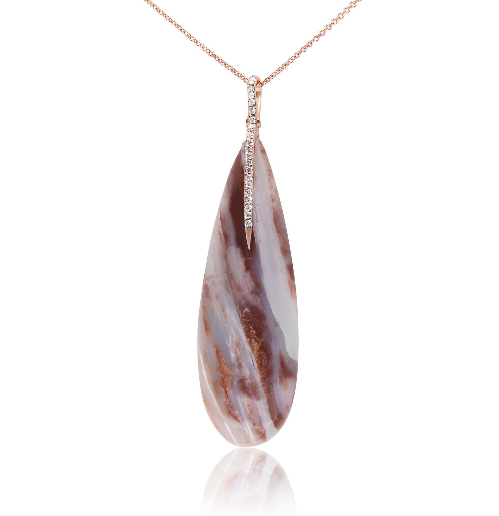 Material: 14K Rose Gold
Center Stone Details: 1 Pear Shaped Agate at 36.30 Carats Total 
Diamond Details: 23 Round White Diamonds at 0.14 Carats Total - Clarity: SI / Color: H-I

Fine one-of-a-kind craftsmanship meets incredible quality in this