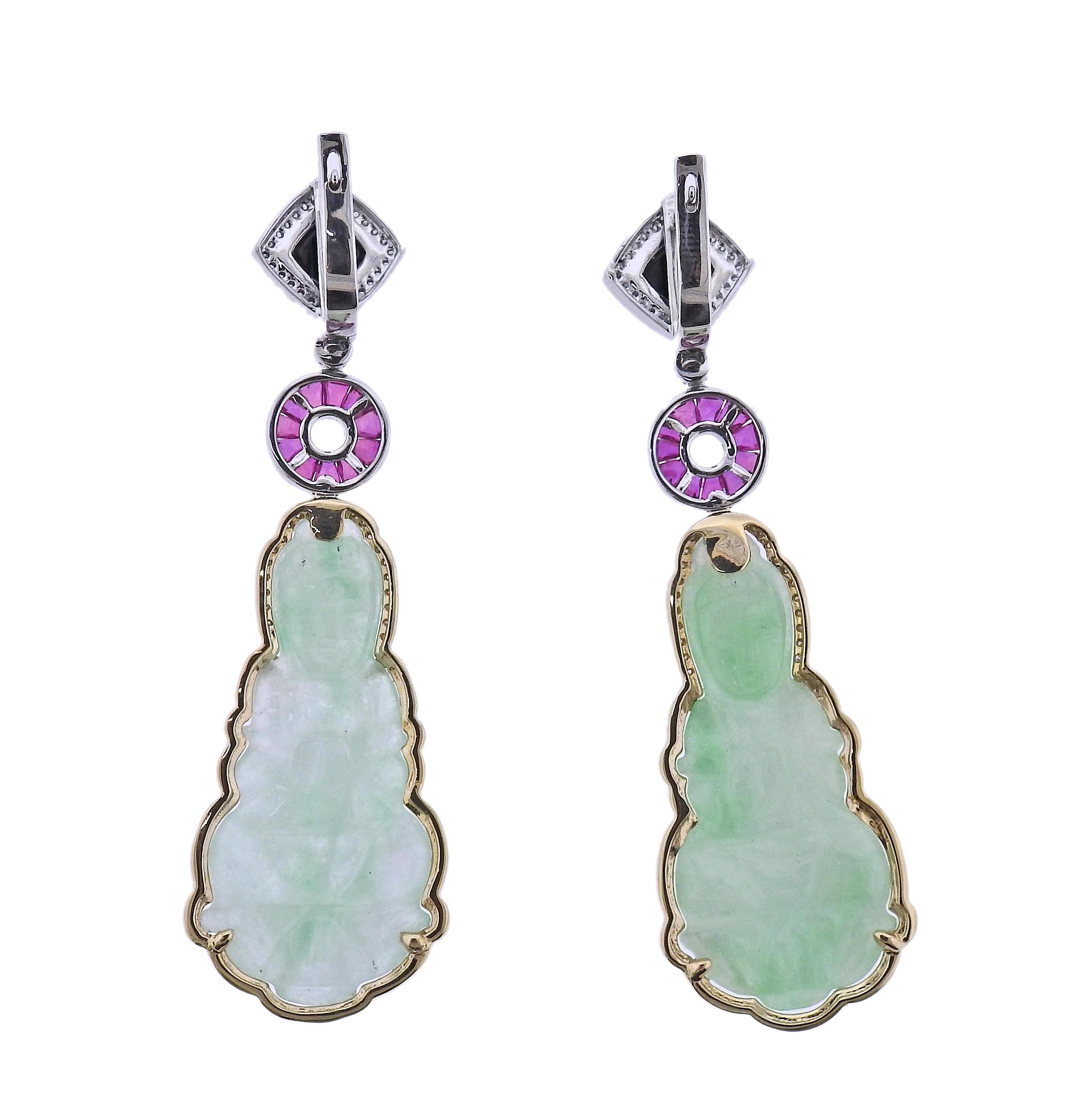 Pair of 14k gold drop earrings, with 36.33ctw carved jadeite jade, pink sapphires, onyx and 0.77ctw in diamonds. Earrings are 62mm x 20mm. Marked 585. Weight - 17.8 grams.