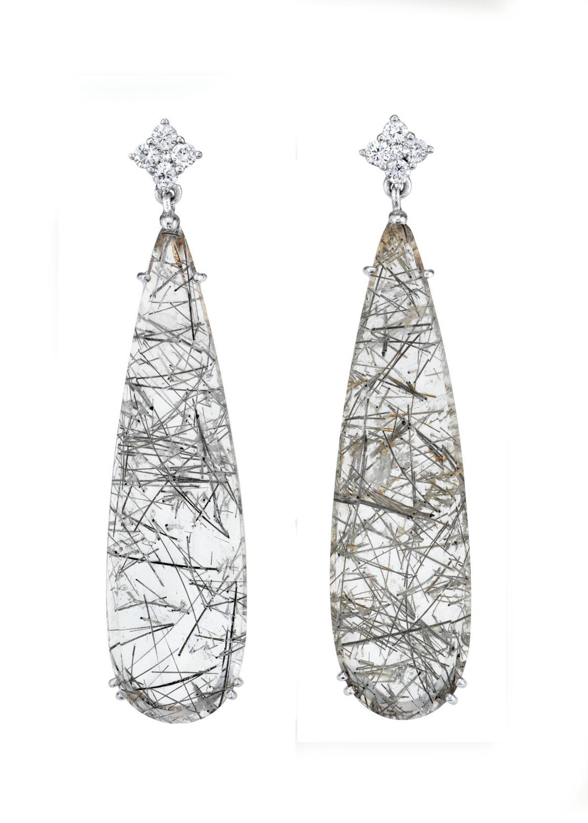 These knock-out gemstone earrings could rock the red carpet or be worn with jeans and a crisp white shirt, depending on the occasion! They feature clear quartz crystal drops with gorgeous actinolite 