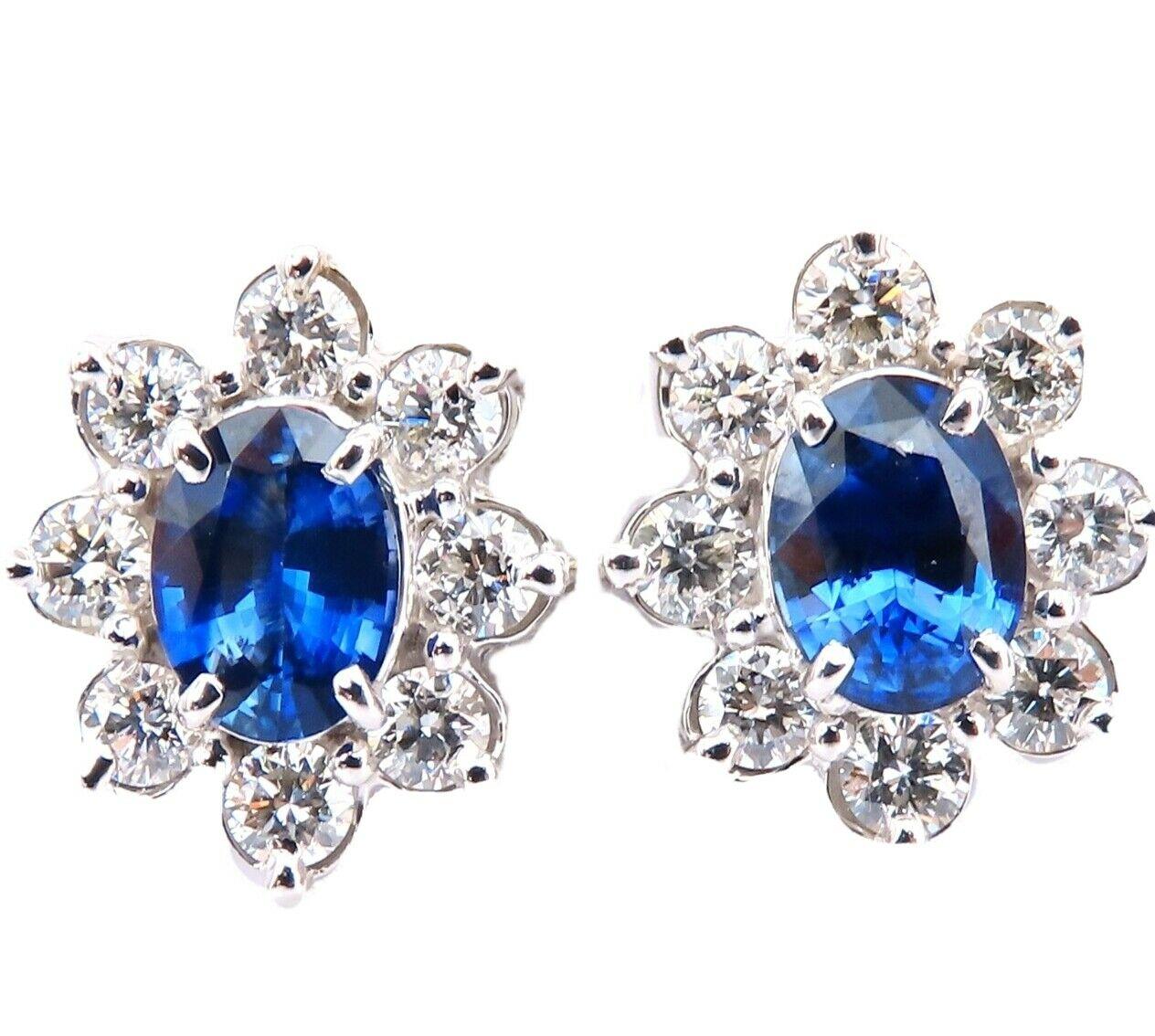 Cluster Halo prime.

2.30 carat natural oval sapphires.

Royal blue, clean clarity and transparent.

7.5 x 5.5 mm each.

1.33ct natural round diamonds.

G color vs2 clarity

14kt white gold 6 grams.

$12,000 appraisal certificate will accompany