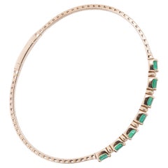 Bracciale rigido flessibile con diamanti e smeraldi da 3,64 carati in oro giallo 14K