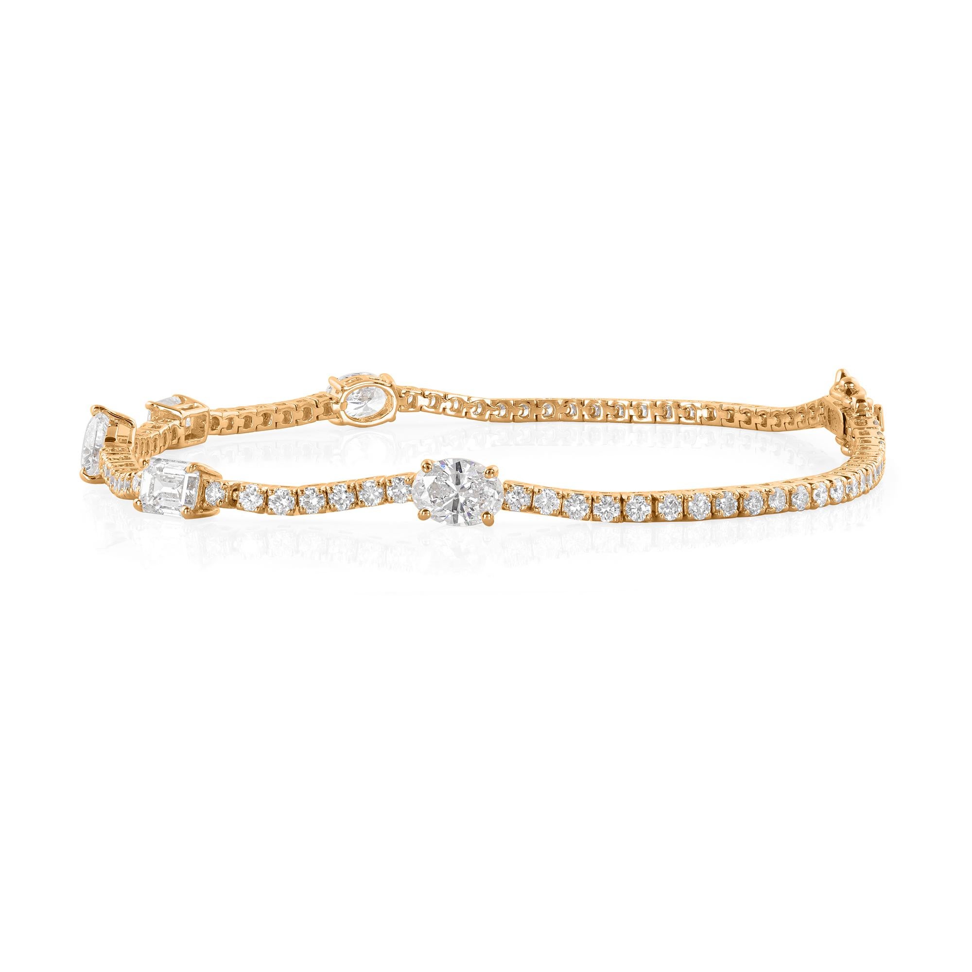 Elevate your style with the enchanting allure of this exquisite 3.64 carat Multi-Shape Diamond Bracelet, meticulously handcrafted in luxurious 14 karat yellow gold. This stunning piece of handmade jewelry celebrates the diversity and brilliance of