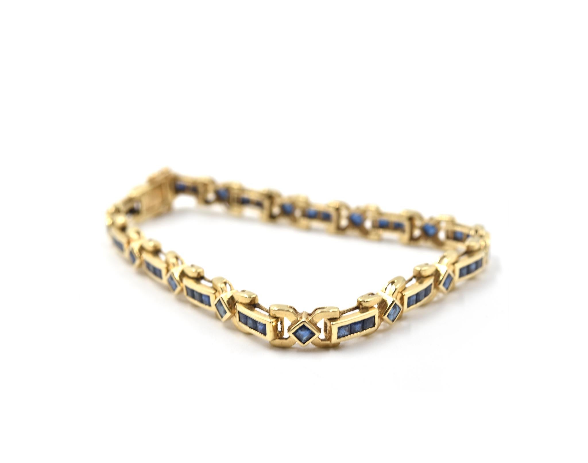Designer: custom design
Material: 14k yellow gold
Sapphires: 52 square cut = 3.64 carat weight
Dimensions: bracelet is 7 1/2-inch long
Weight: 15.1 grams
