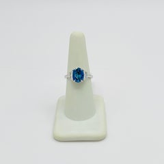 3.65 Carat Blue Sapphire Oval and Half Moon Diamond Ring in 18K White Gold