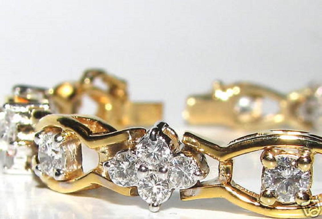 3.65ct. Clusters diamond bracelet.

G-color, Vs-2 clarity.

Diamonds are full of life and sparkles / full cuts

7 inches long & 6mm wide

14kt. yellow gold

Now is your chance to buy direct!!!!

15.8gms.

You will NEVER find a bracelet in this size
