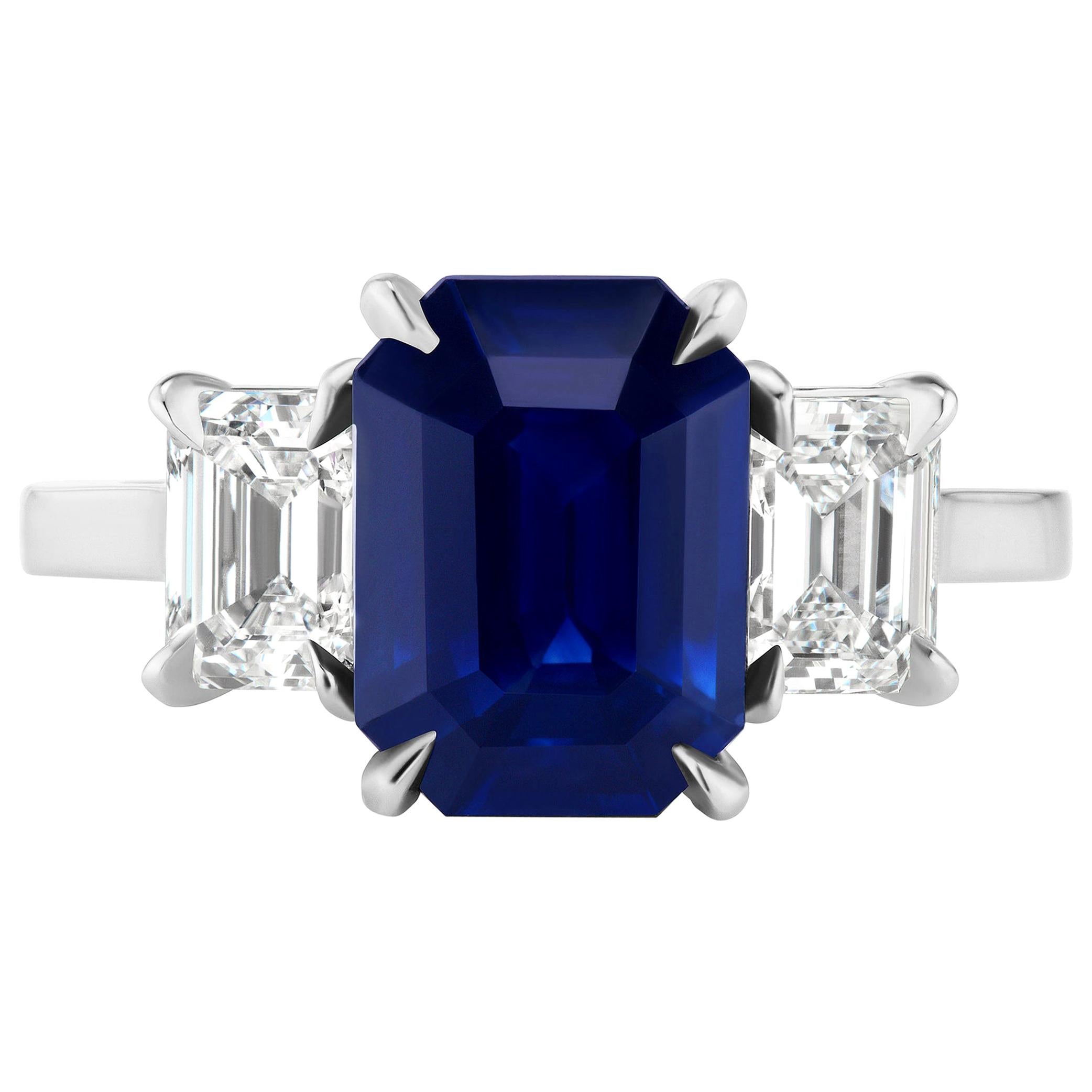 GIA Certified 3.65 Carat Emerald Cut Blue Sapphire and Diamond Three-Stone Ring