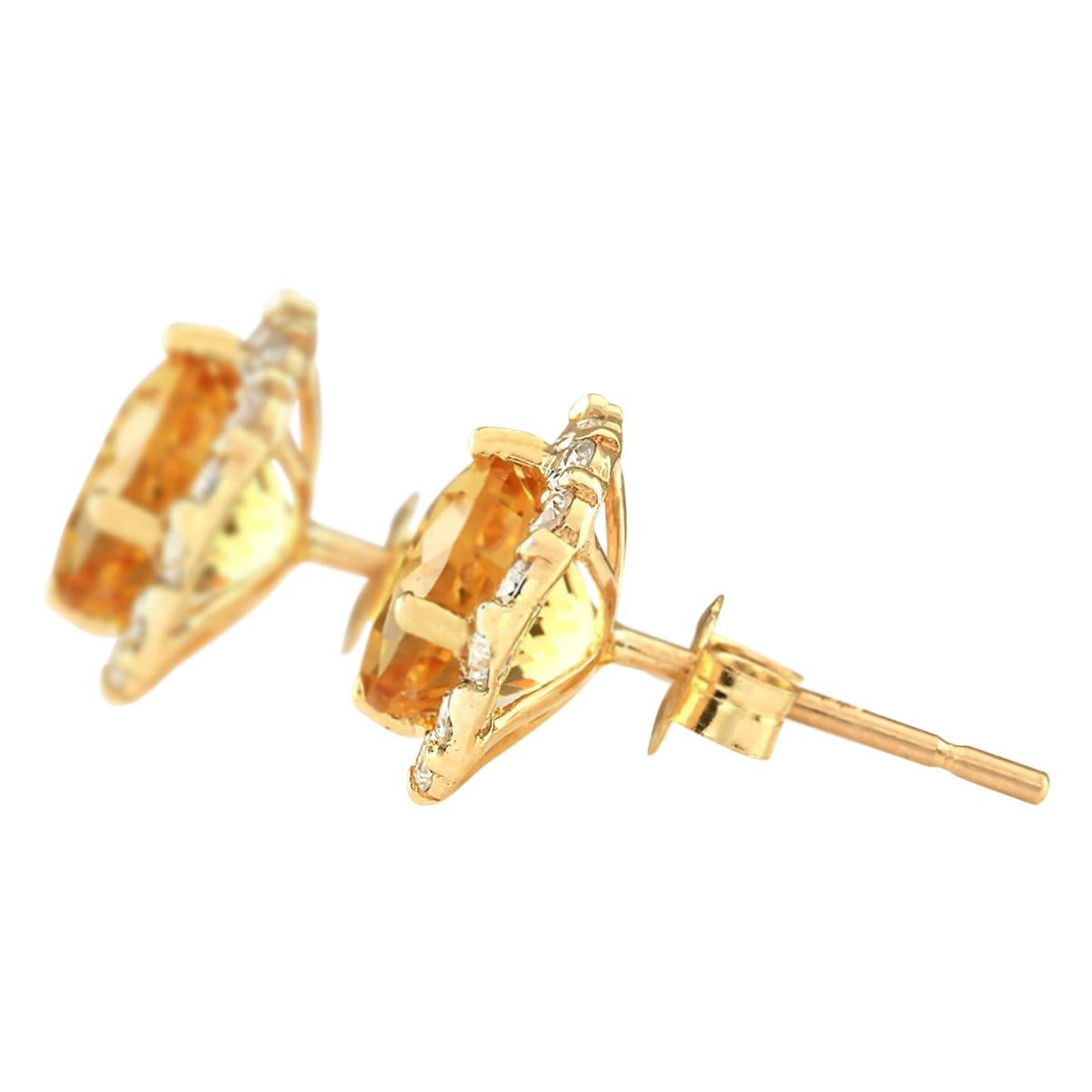 3.65 Carat Natural Citrine 14 Karat Yellow Gold Diamond Earrings
Stamped: 14K Yellow Gold
Total Earrings Weight: 2.0 Grams
Total Natural Citrine Weight is 3.00 Carat (Measures: 7.00x7.00 mm)
Color: Orange
Total Natural Diamond Weight is 0.65