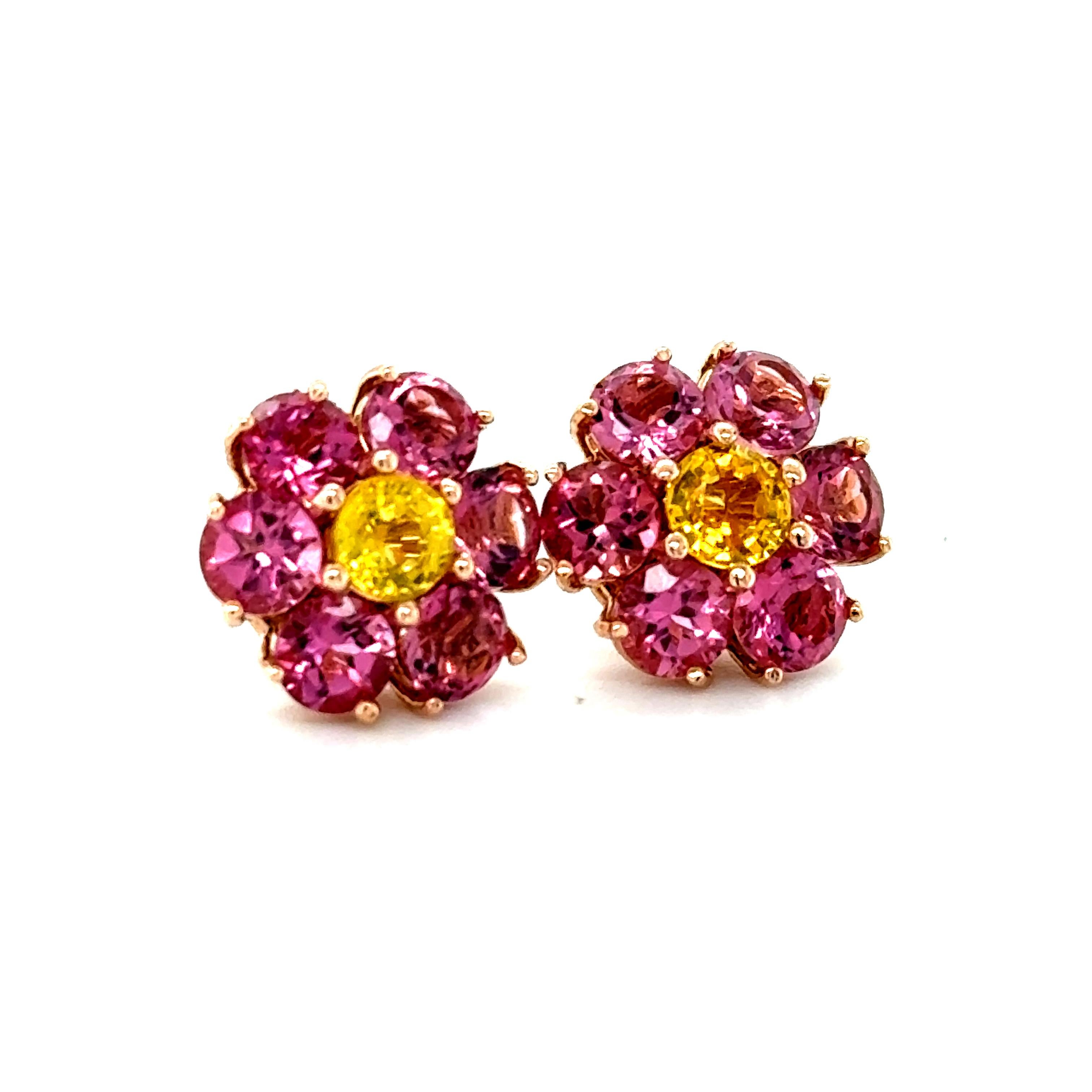 Cute, dainty earrings that are versatile and great for an everyday look! 
3.65 Carat Natural Pink Tourmaline Sapphire Rose Gold Stud Earrings

There are 12 Pink Tourmalines (2.88 carats) and 2 Yellow Sapphires (0.77 carats) set to create a Flower