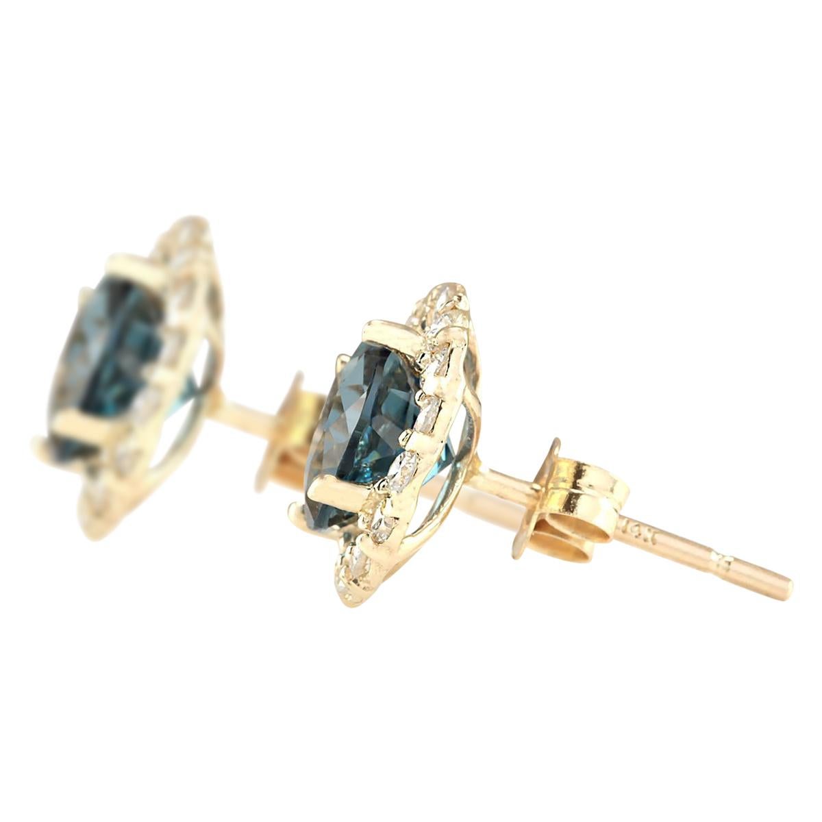Stamped: 14K Yellow Gold
Total Earrings Weight: 2.0 Grams
Total Natural Topaz Weight is 3.00 Carat (Measures: 7.00x7.00 mm)
Color: London Blue
Total Natural Diamond Weight is 0.65 Carat
Color: F-G, Clarity: VS2-SI1
Face Measures: 10.60x10.60 mm
Sku: