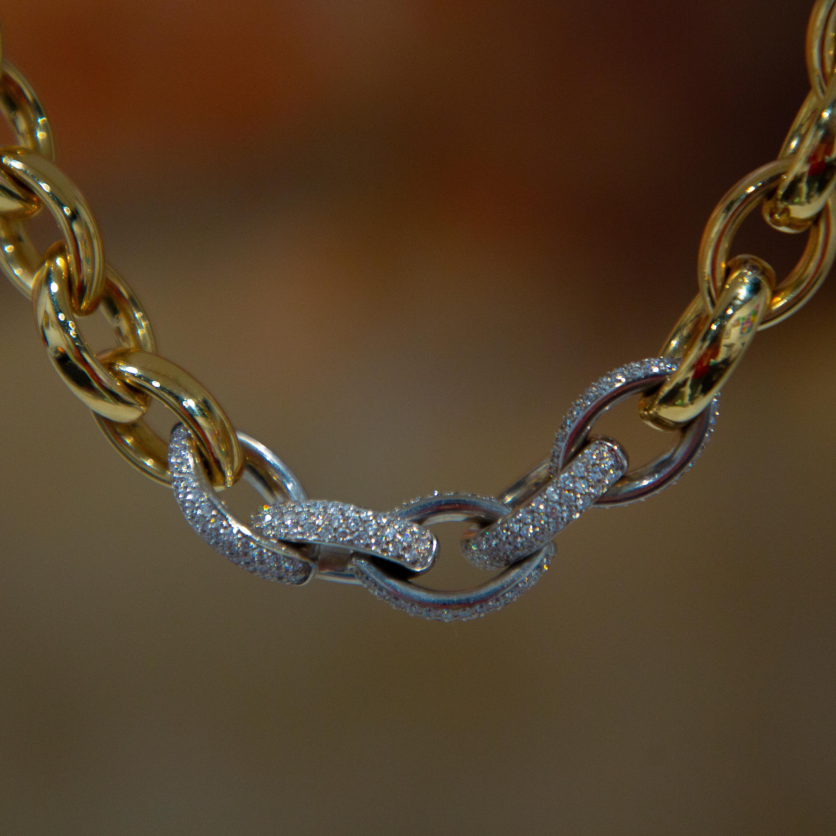 A handmade 18k link chain by Vaid Roma is the ultimate in Italian design and fabrication. The links hug warmly and softly to the wearer, providing fluid and comfortable heft with all links being solid through. Five white gold links are Pave' set to