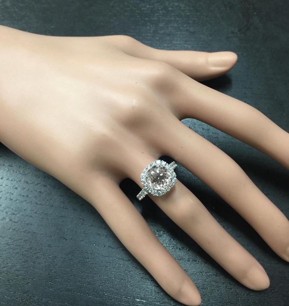 3,65 quilates Exquisita Morganita Natural y Diamante Anillo de Oro Blanco Macizo de 14 quilates

Peso total de Morganita natural: 2,40 quilates

Medidas de la Morganita 9.13mm

Diamantes redondos naturales Peso: 1,25 quilates (color G / Claridad