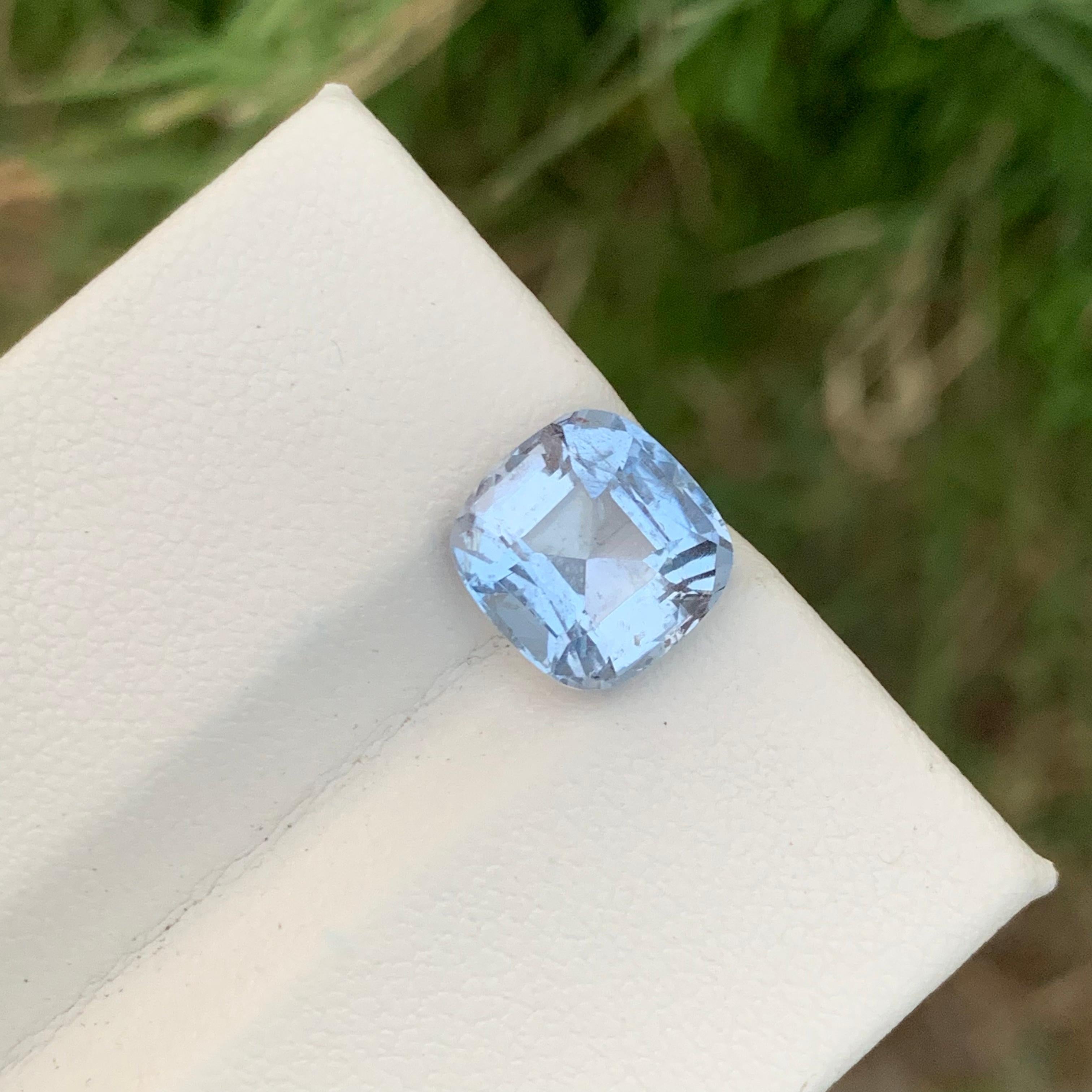 Faceted Goshenite 
Weight: 3.65 Carats 
Dimension: 10.1x9.8x7 Mm
Origin: Pakistan 
Shape: Cushion 
Color: Light Blue
Certficate; On Customer Demand 
.
Goshenite, a captivating and pristine gemstone, belongs to the beryl mineral family, which also