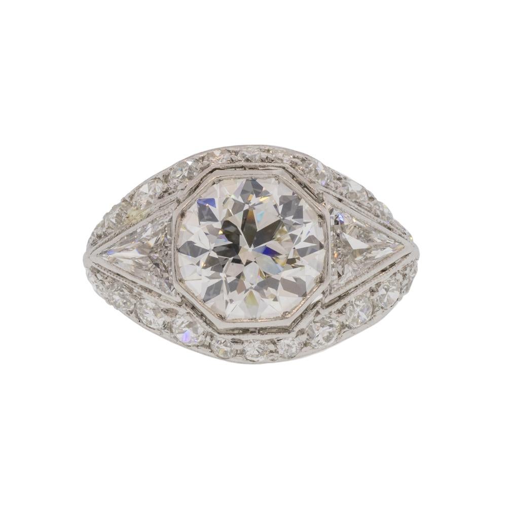 Indulge in vintage excellence with this 3.65ct Old European Cut diamond antique platinum ring. The show-stopping old European cut diamond boasts a K-L color and a sparkling VS2 clarity that wows the eye. Approximately 6.26ctw the whole piece is