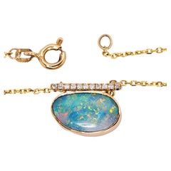 3,65 Karat, 15x10 mm Boulder-Opal-Anhänger mit natürlichen Diamant-Akzenten aus 14K Gold