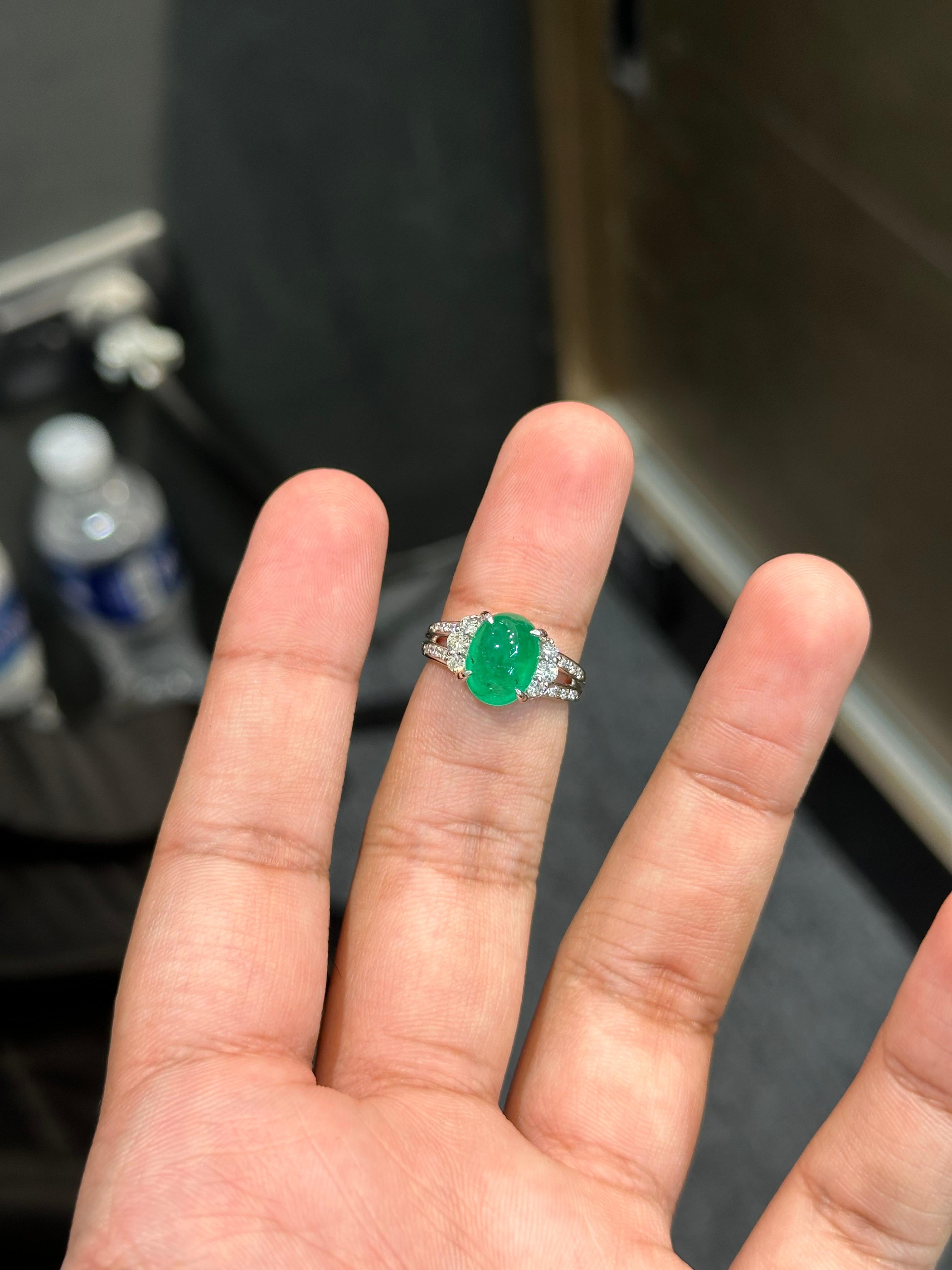 Introducing the epitome of luxury and sophistication, behold the breathtaking Art Deco inspired, Emerald Statement Ring, a true marvel in the world of fine jewelry. Crafted with precision and passion, this extravagant piece exudes opulence from