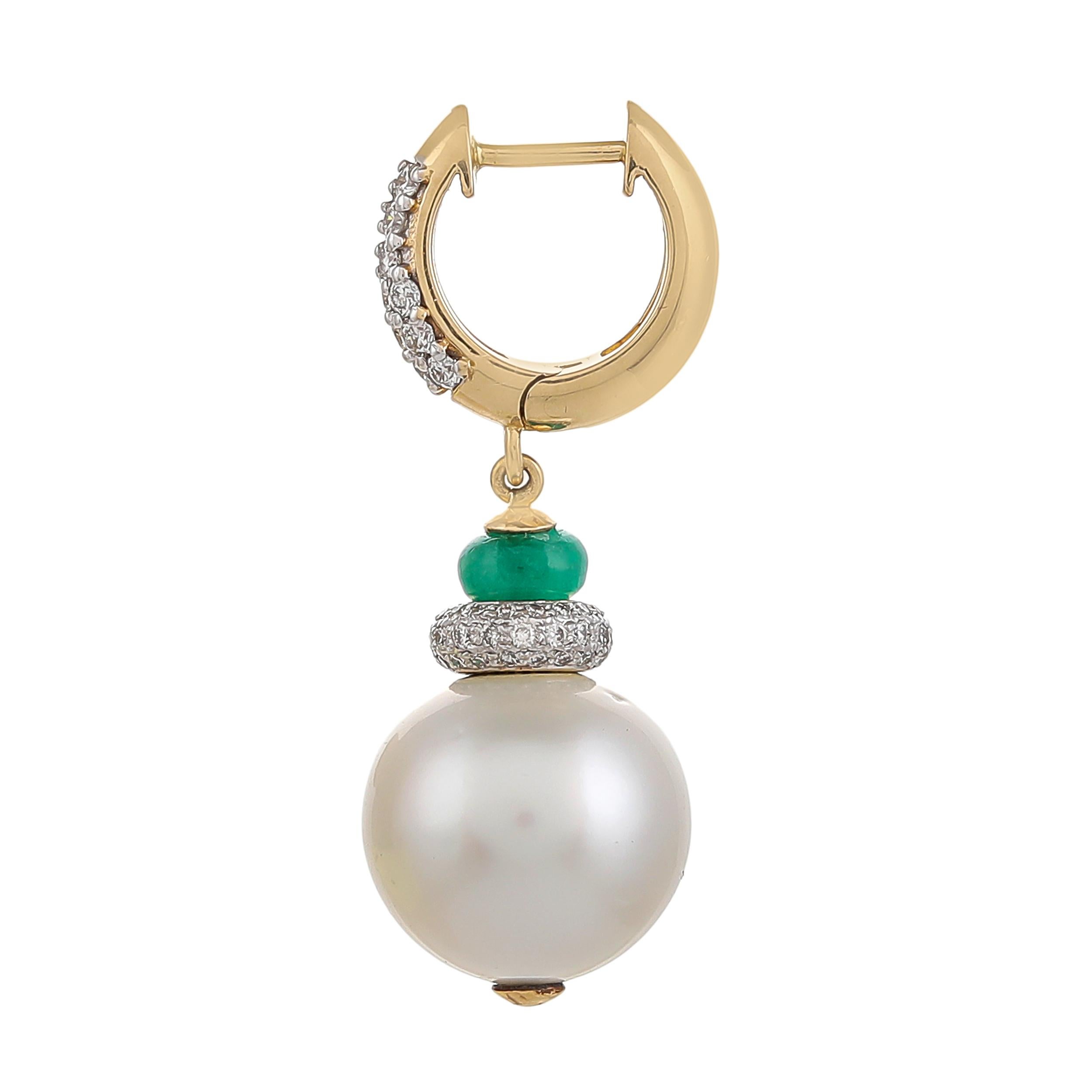 Classic and contemporary earrings handcrafted in 18kt yellow gold enhanced with 13.50mm round South sea pearl weighing approximately 36.60 Carats Accentuated with Zambian emerald bead weighing approximately 1.59 Carats further accented with