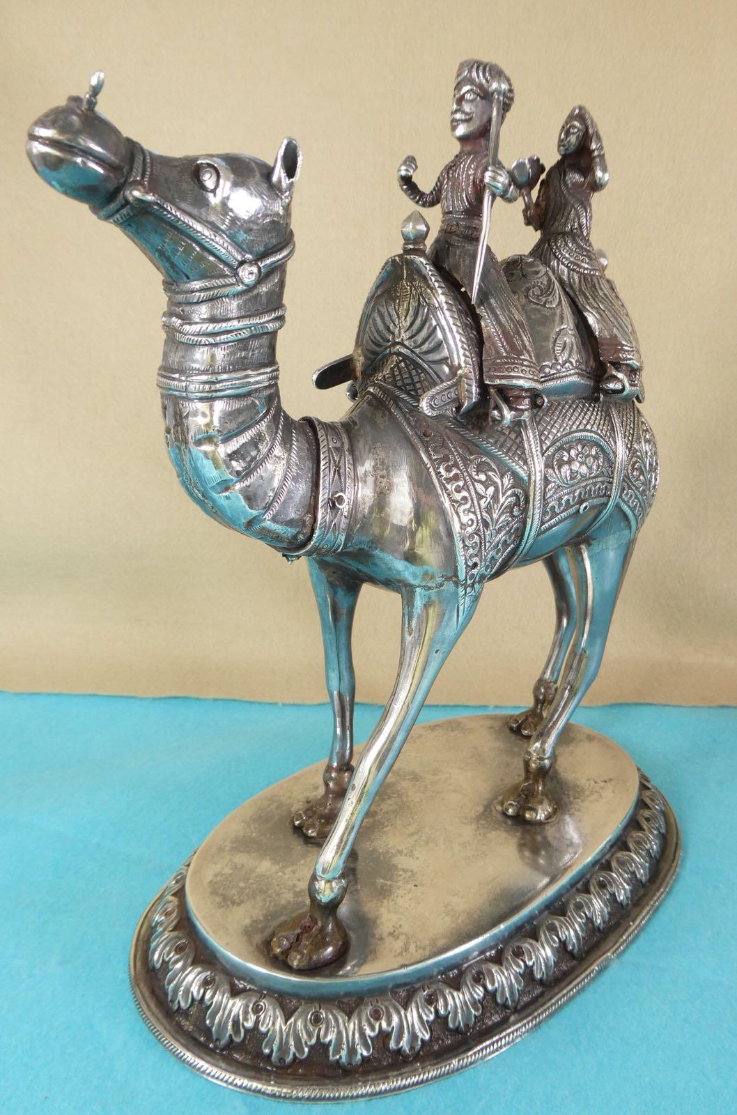 Magnificent antique Colonial Indian silver camel with riders, 
circa 1880

Measures: 11.5