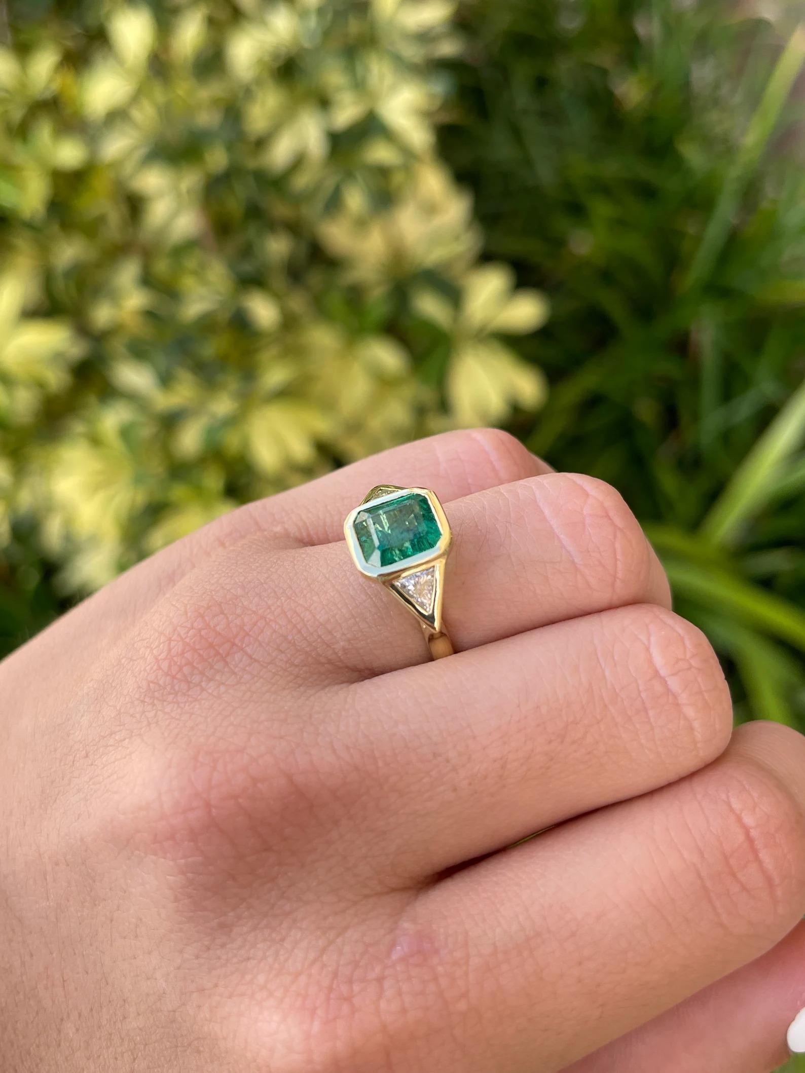 Emerald Cut 3.66tcw High Quality Three Stone Emerald & Trillion Diamond Bezel Set Ring 18K For Sale