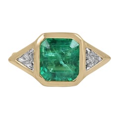 3(66tcw High Quality Three Stone Emerald & Trillion Diamond Bezel Set 18K (bague à chaton avec émeraude et diamant trillion)