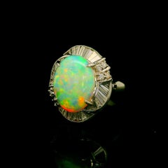 Anello a spirale in platino con diamanti e opale cristallino australiano da 3,67 carati