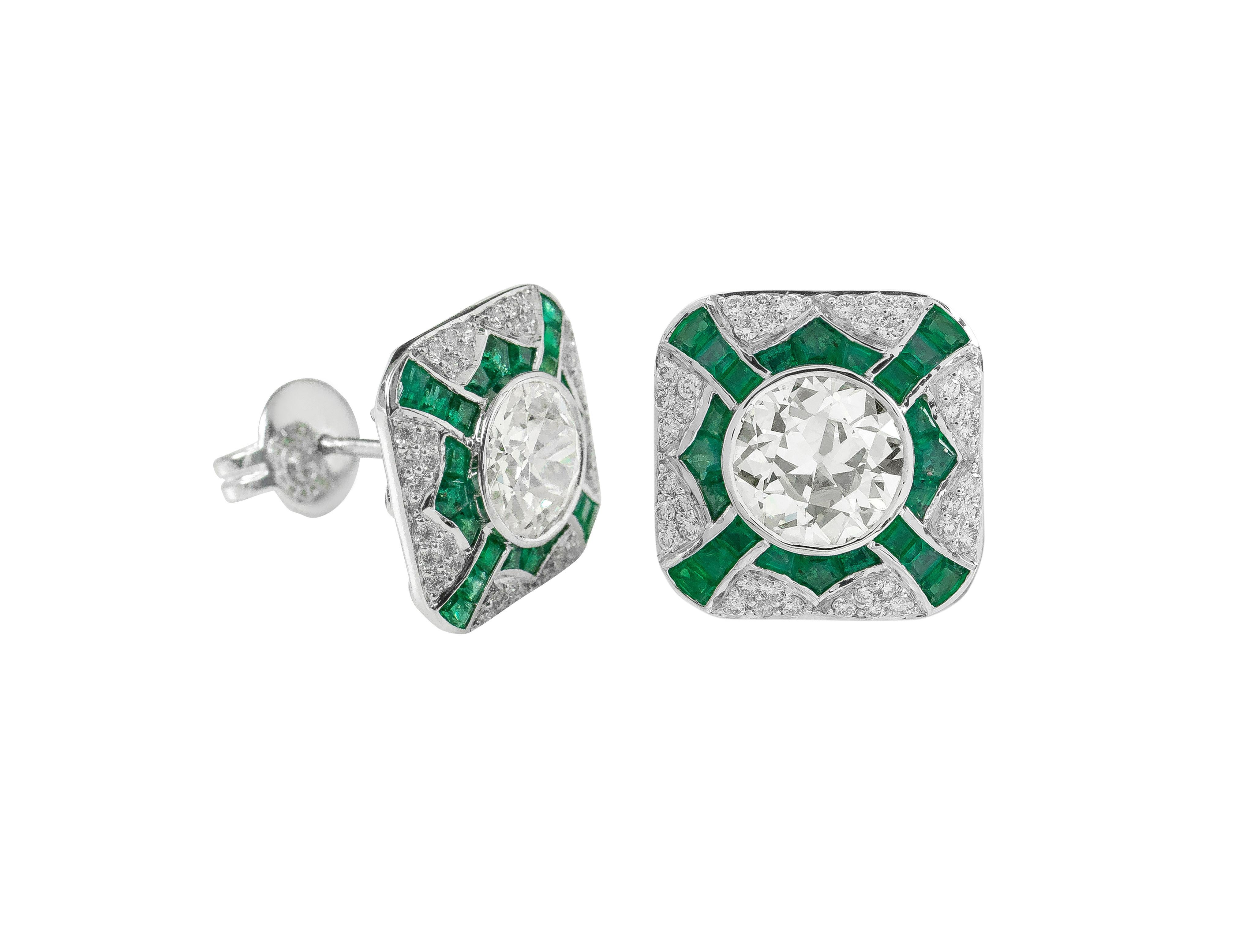 3.67 Carat Old European Cut Diamond with Emerald Stud Earrings in Art-Deco Style

This old mutual/European cut diamond solitaire pair is a phenomenal princely design. The diamond pair of 3.67 carats is an antique 58 facets cut without the precision