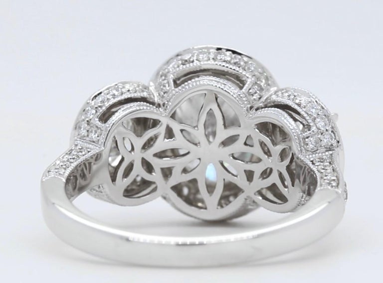 Art Deco 3.67 Carat Oval GIA Certified Diamond Three-Stone Ring 18K For Sale
