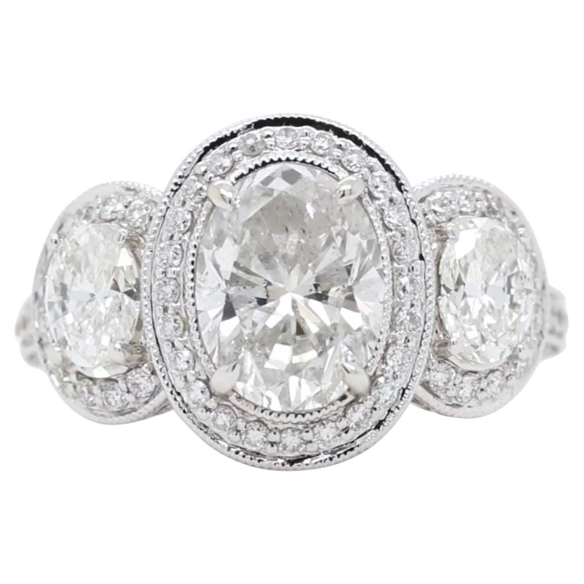 3.67 Carat Oval GIA Certified Diamond Three-Stone Ring 18K