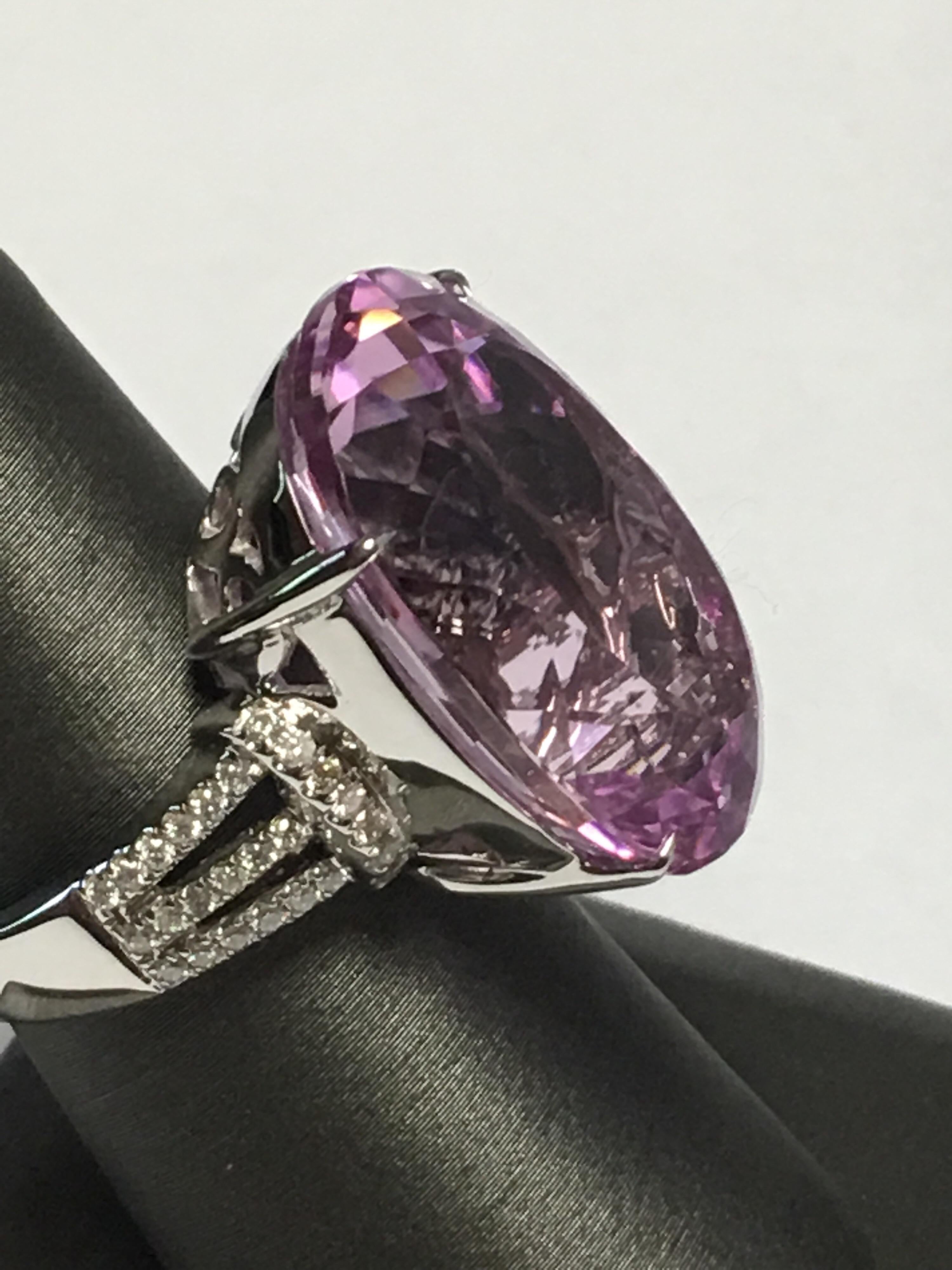 36.76 Carat  Kunzite Ring set in 14 K White gold .
Oval shape, Brilliant color.
Total gold: 8.11 gm
One of a kind handcrafted ring.
