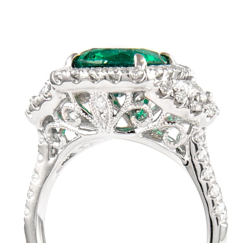 Women's 3.67ctt Emerald with Diamond Three Stone Halo Ring 18 Karat Gold For Sale