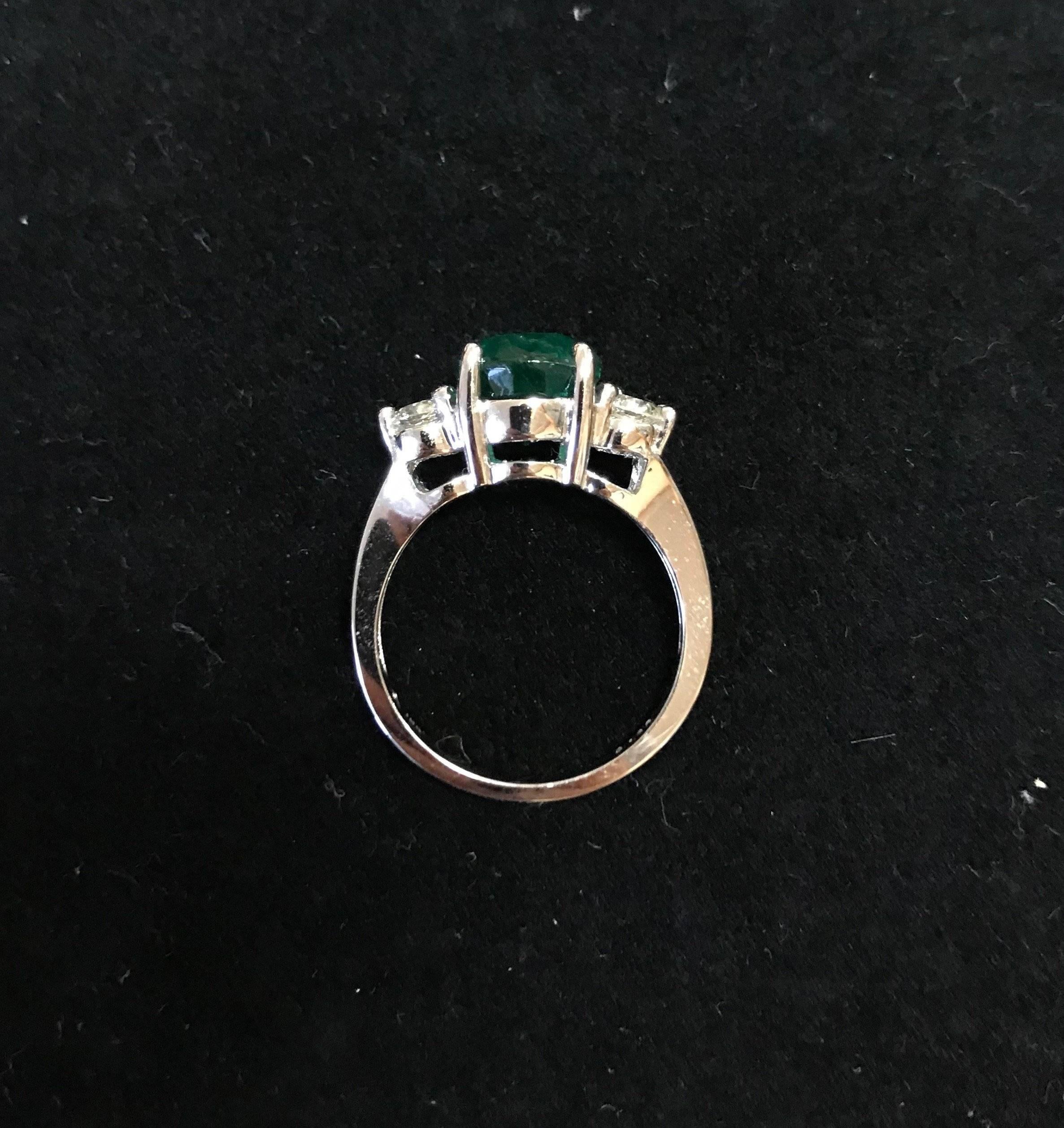 Oval Emerald and Diamond Side Stone Engagement Ring In New Condition In GREAT NECK, NY