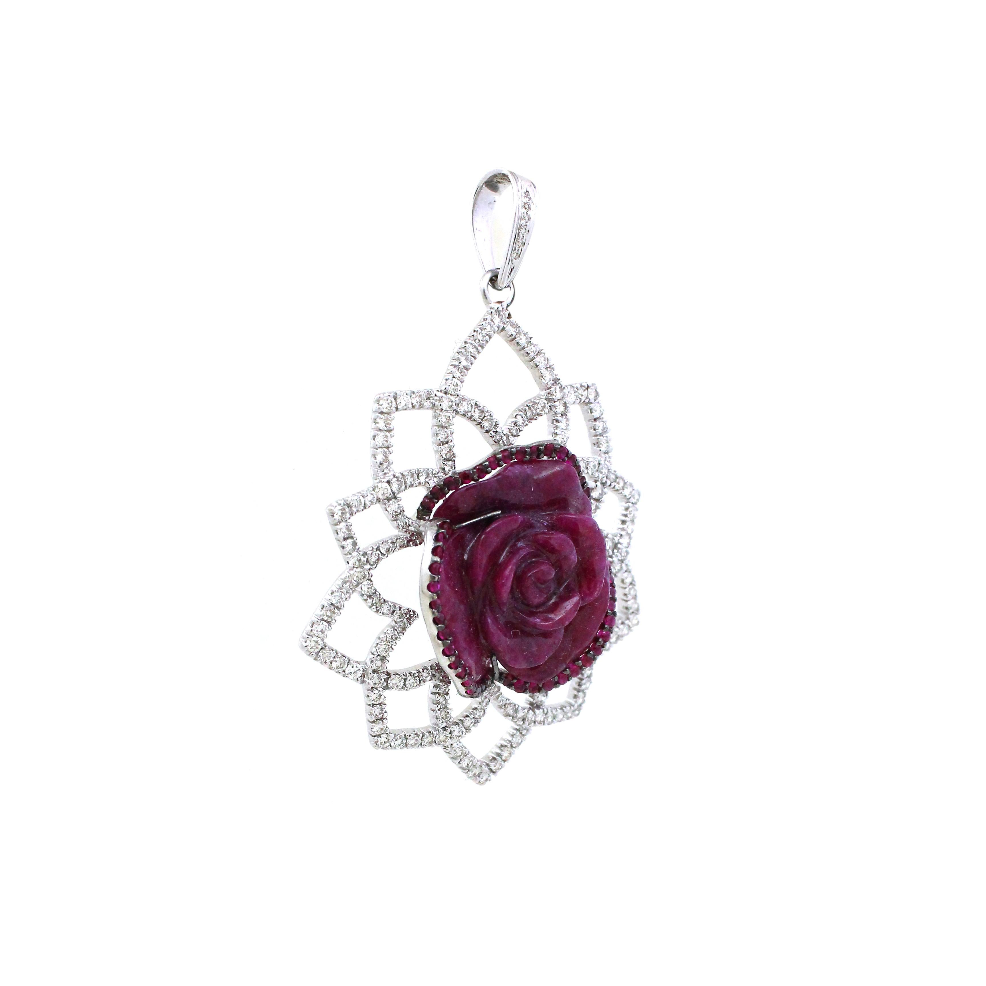 Prepare to be enchanted by our luxurious pendant, meticulously crafted from gleaming 18k white gold, boasting a substantial weight of 18.22 grams. At its core lies a mesmerizing centerpiece—a single carved ruby meticulously shaped into the exquisite