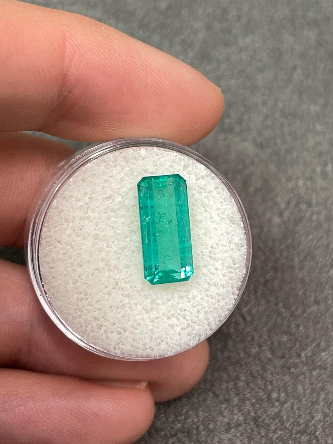 Modern 3.68ct Bluish Green Elongated Emerald Cut Muzo Colombian Emerald Genuine May For Sale