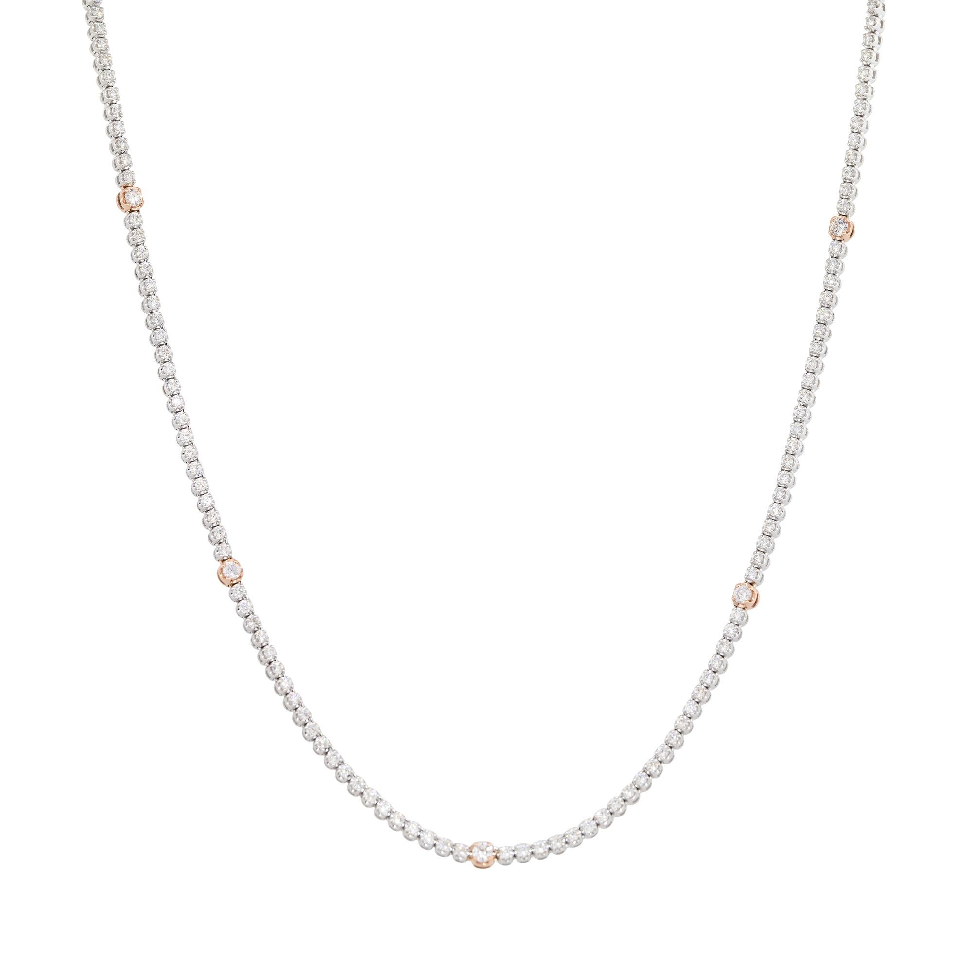 There are many reasons why this tennis necklace is so unique. To begin, not all the diamonds are the same size, as there are 7 larger diamond stations along the necklace. In addition to those stations, the 7 larger diamond stations are also set in
