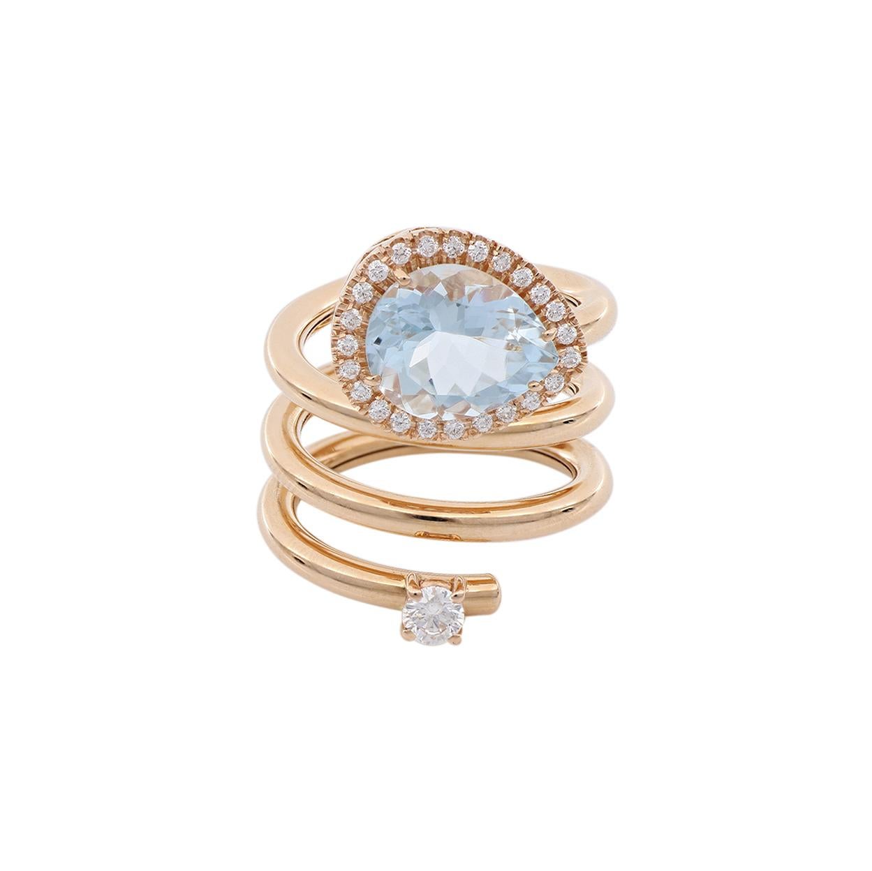 This 18 Kt rose gold spiral ring begins with a diamond accent on one end and culminates in a stunning pear-cut aquamarine with a glistering diamond halo. Being a March birthstone, aquamarine represents the transformation and rebirth of energy and