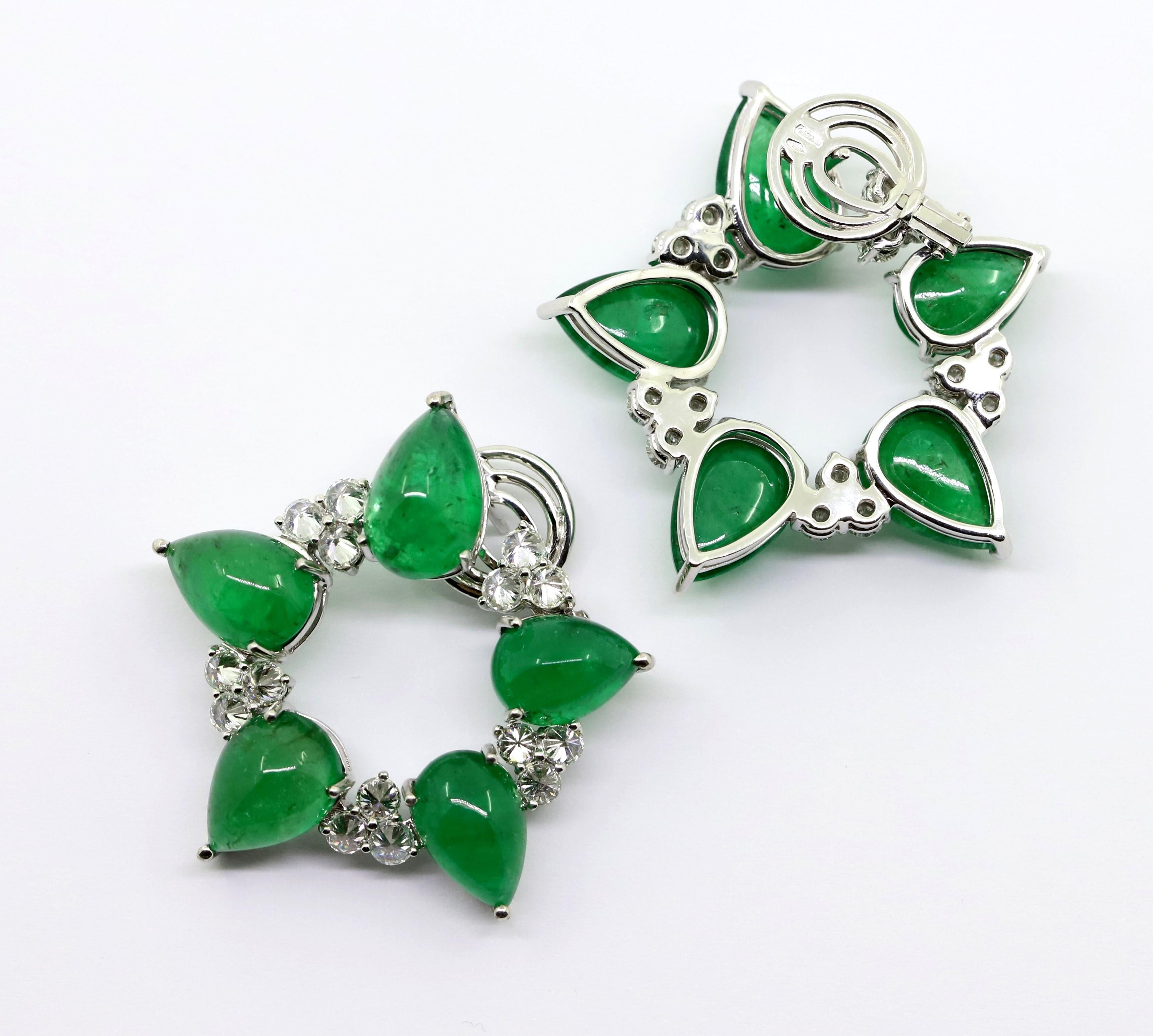 A stars in green! 
5 drop cut emerald cabochons along with 15 brilliant cut diamonds up-down draw a star.

Object Made in Italy.