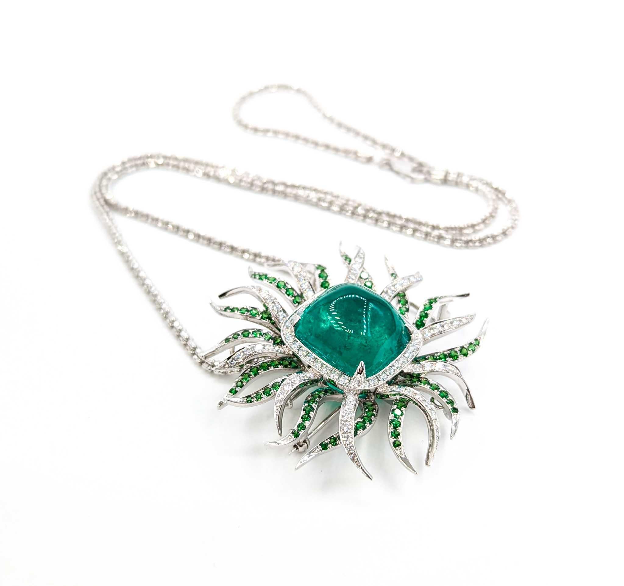 36.97ct Colombian Emerald & Diamond Pendant/Brooch in 18kt White Gold

Introducing this stunning pendant/brooch, crafted in 18k white gold. This exquisite piece features 2.98 ctw of VS clarity, near-colorless diamonds that provide a brilliant,