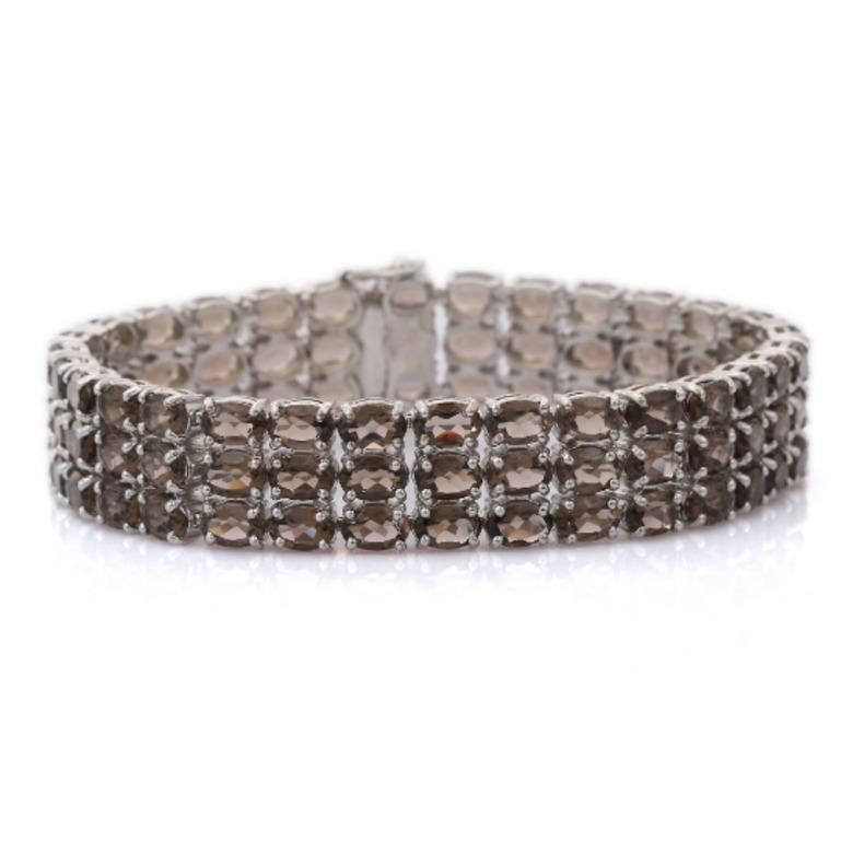 Beautifully handcrafted silver 36.98 Carat Smoky Topaz Three Layer Wide Bracelet, designed with love, including handpicked luxury gemstones for each designer piece. Grab the spotlight with this exquisitely crafted piece. Inlaid with natural smoky
